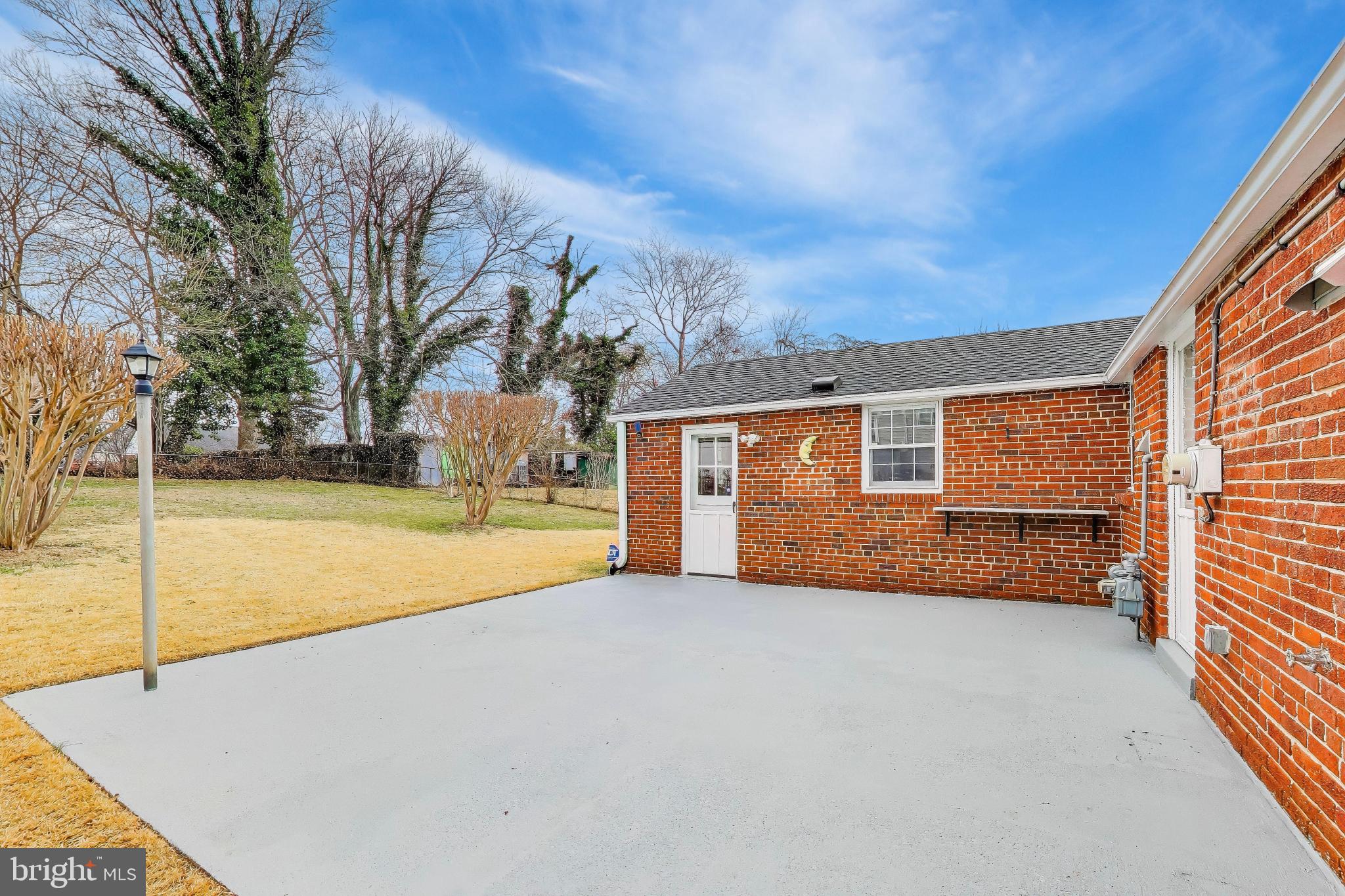 12609 Holdridge Road Silver Spring, MD 20906 - Photo 28 of 30 a view of an house with backyard and trees