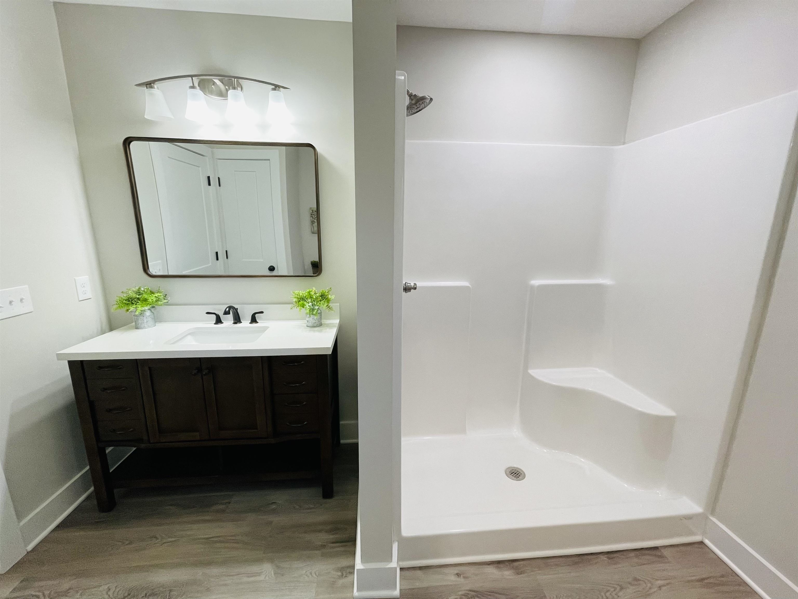 6490 Highway 226 Savannah, TN 38372 - Photo 12 of 38 a bathroom with a sink and a mirror