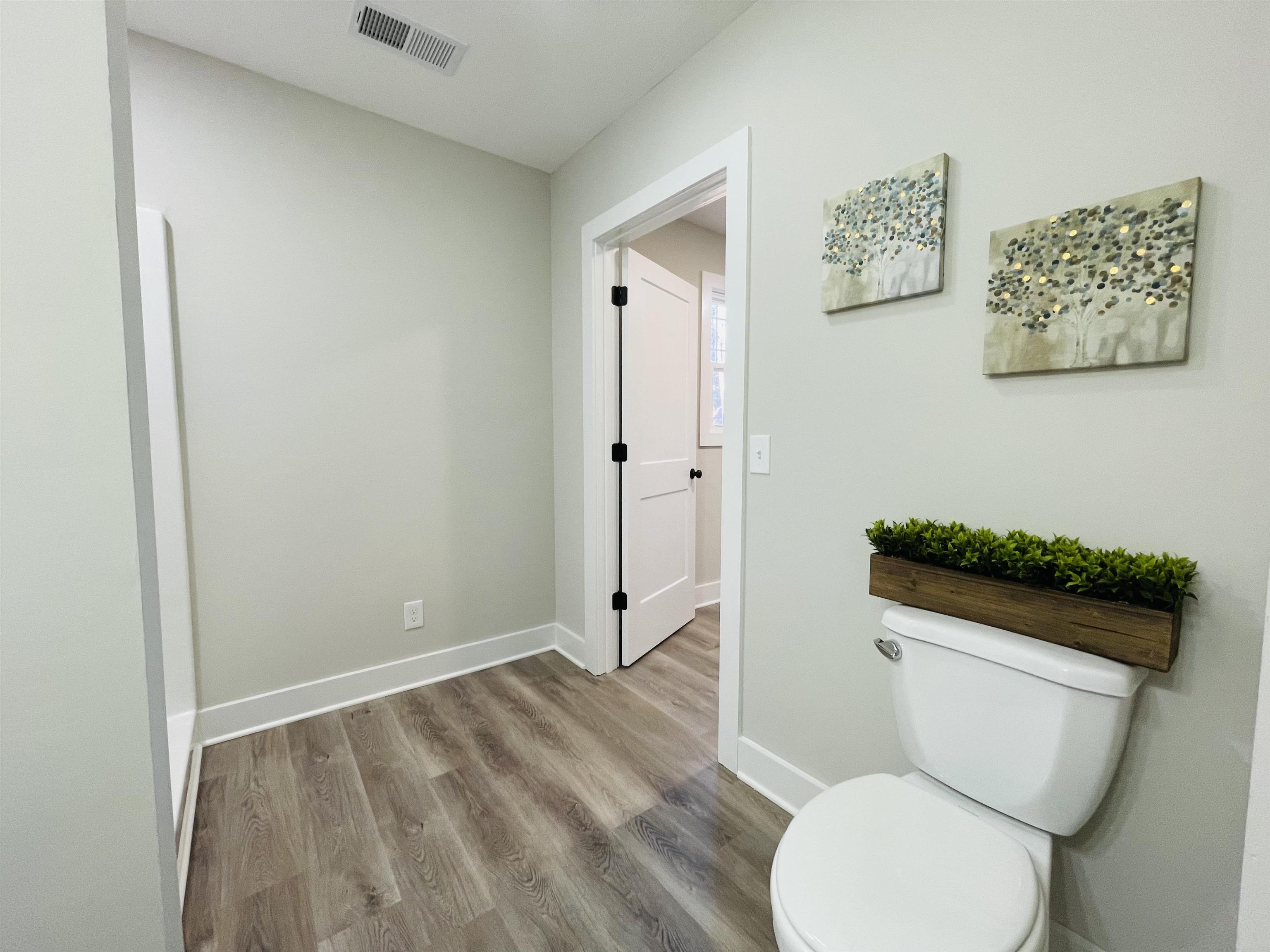 6490 Highway 226 Savannah, TN 38372 - Photo 13 of 38 a bathroom with a toilet and a shower