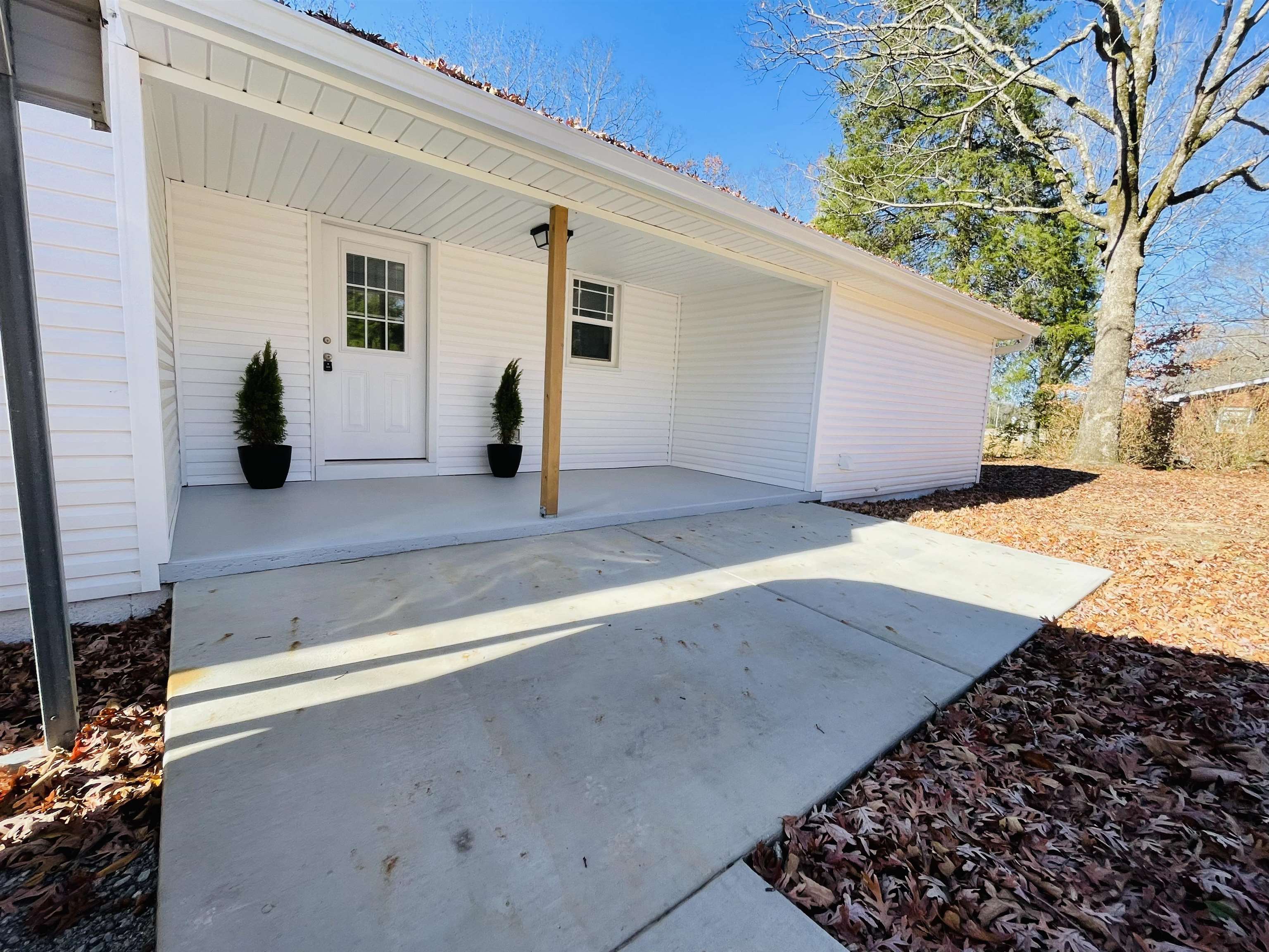 6490 Highway 226 Savannah, TN 38372 - Photo 23 of 38 a view of a house with a backyard