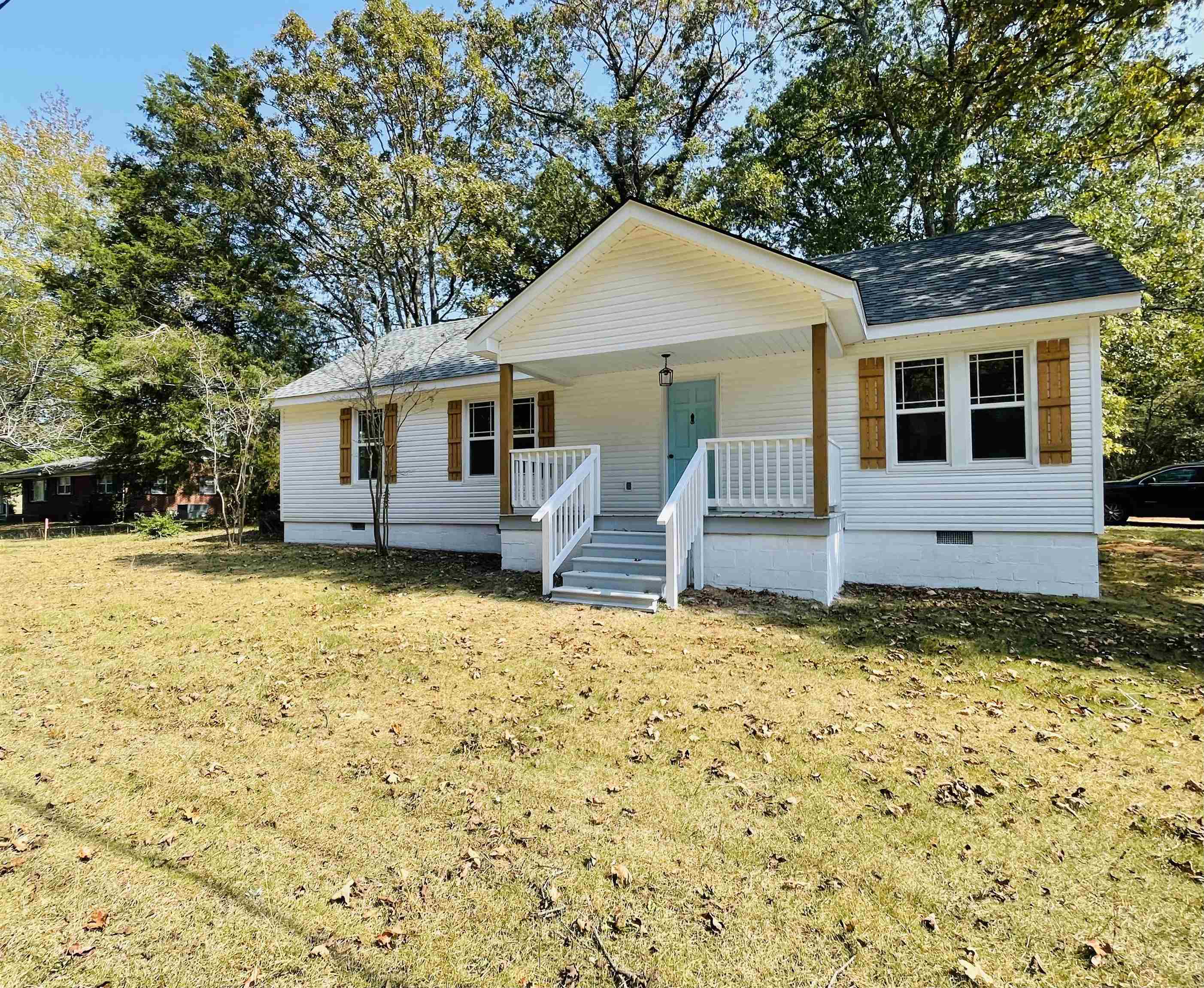 6490 Highway 226 Savannah, TN 38372 - Photo 38 of 38 a front view of house with yard and trees around