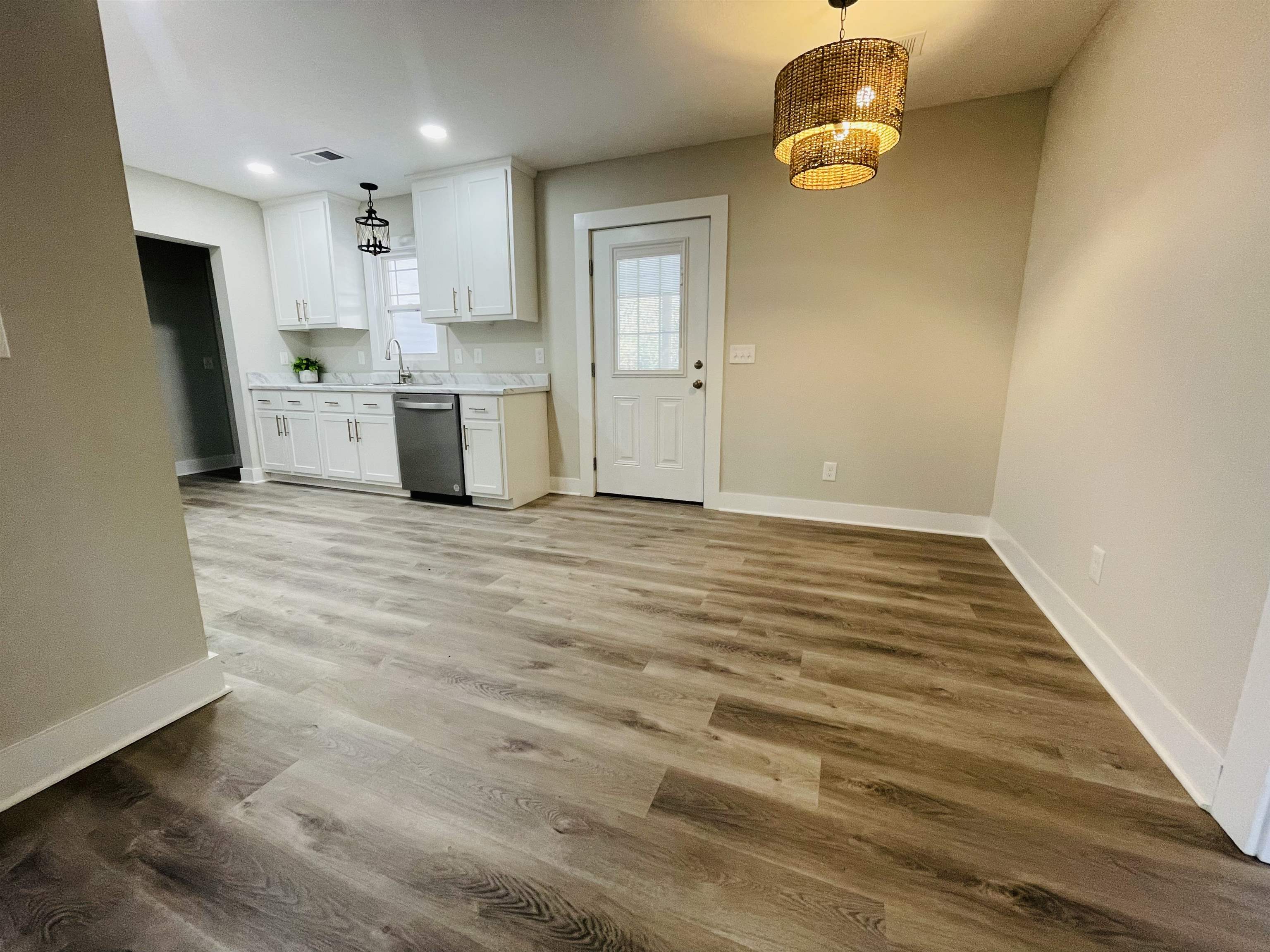 6490 Highway 226 Savannah, TN 38372 - Photo 9 of 38 a view of a kitchen with a sink