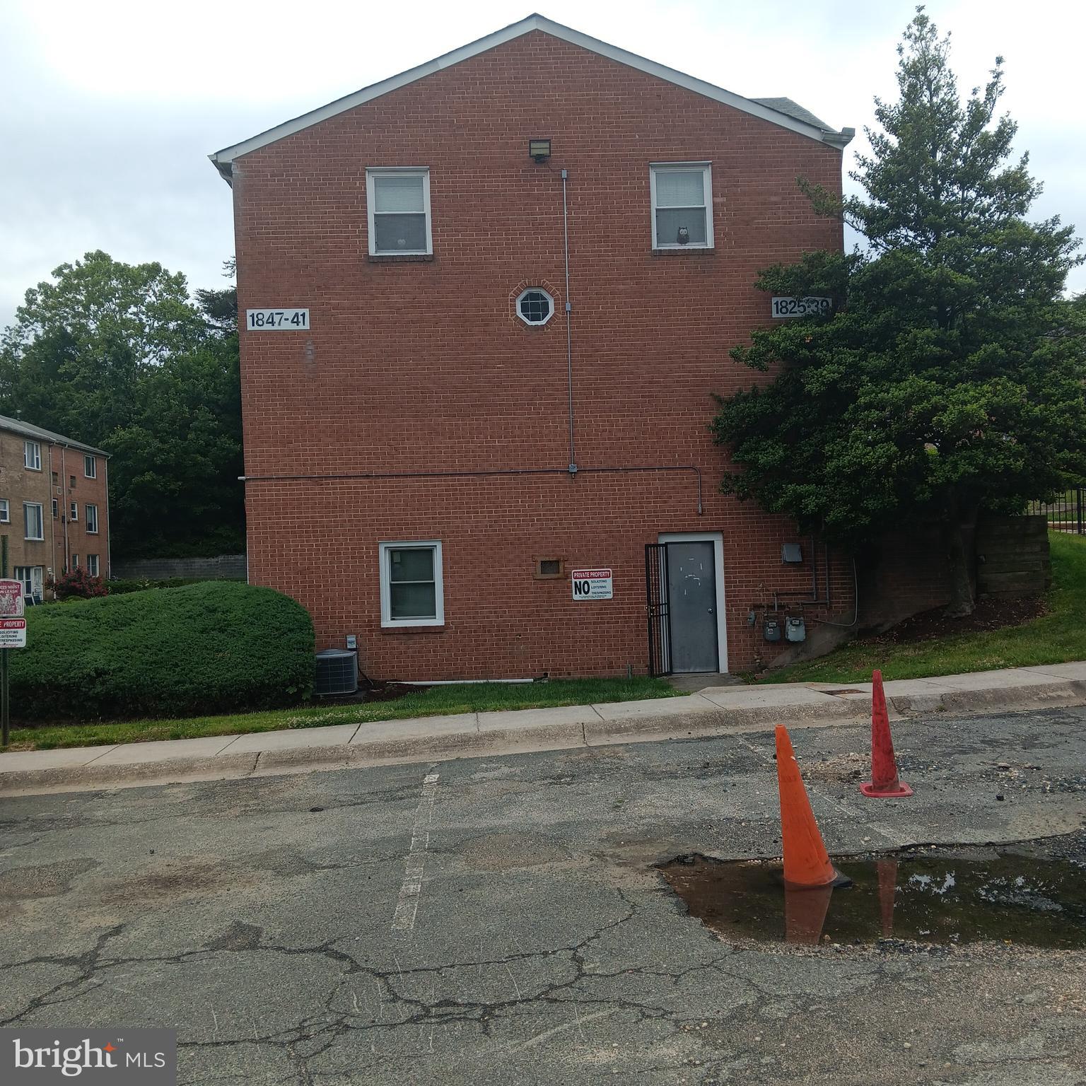 1825 Addison Road South District Heights, MD 20747 - Photo 2 of 40 Side view to laundry