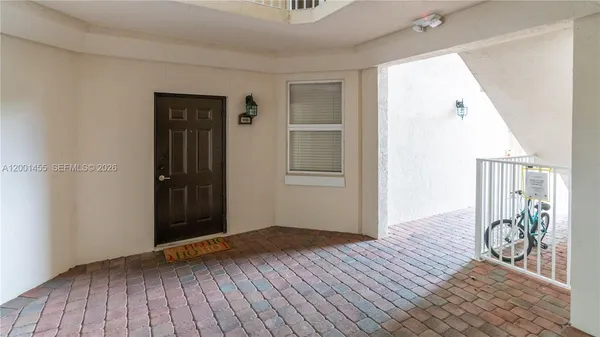 an entryway at livingroom with furniture and wooden floor