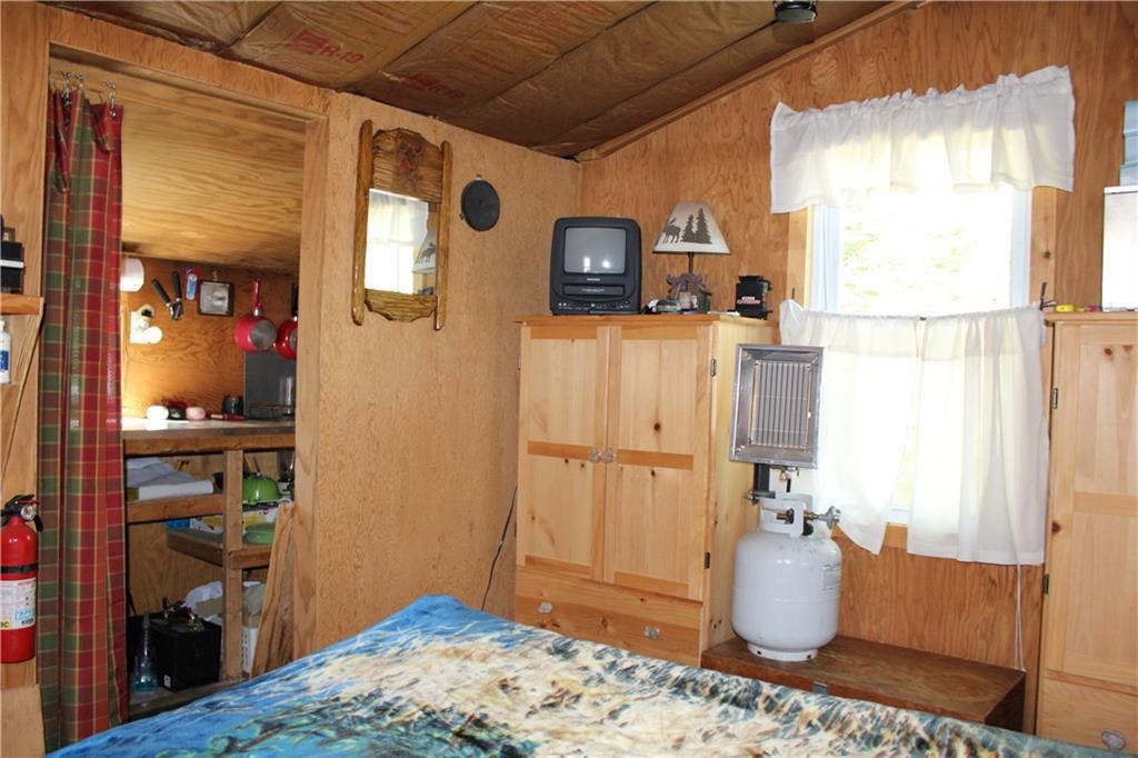 62 Ledge View Road West Forks, ME 04985 - Photo 23 of 33 Bedroom with two storage cabinet. ...