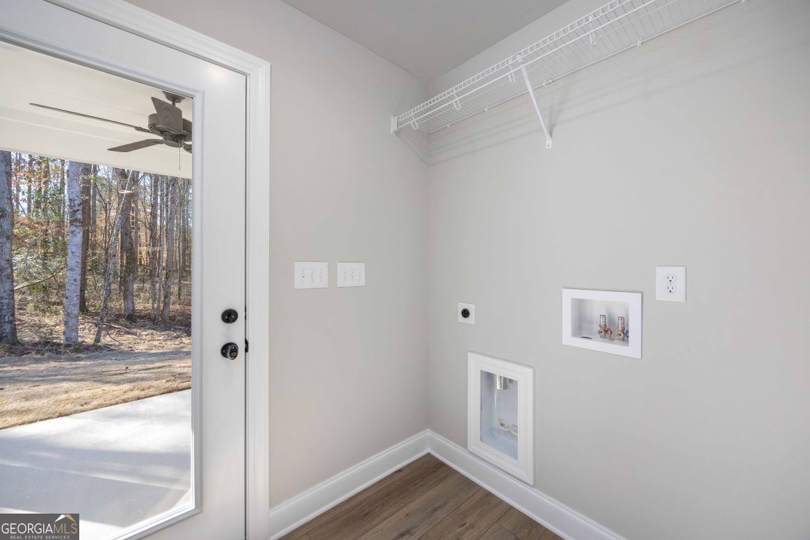 23 Rivers Edge Lane Franklin, GA 30217 - Photo 21 of 32 a view of a hallway with wooden floor and entryway