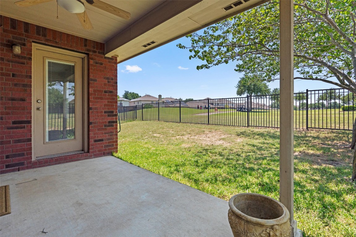 1609 Hidden Springs Path Round Rock, TX 78665 - Photo 24 of 37 a view of porch with a yard