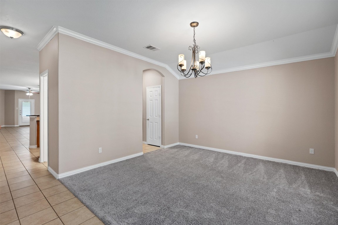 1609 Hidden Springs Path Round Rock, TX 78665 - Photo 5 of 37 a view of an empty room with wooden floor