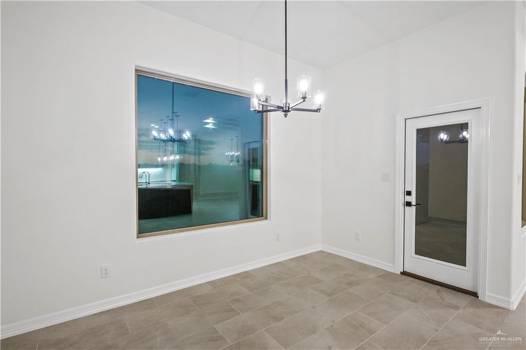 7305 North 55th Lane Mission, TX 78573 - Photo 7 of 26 a view of livingroom and window