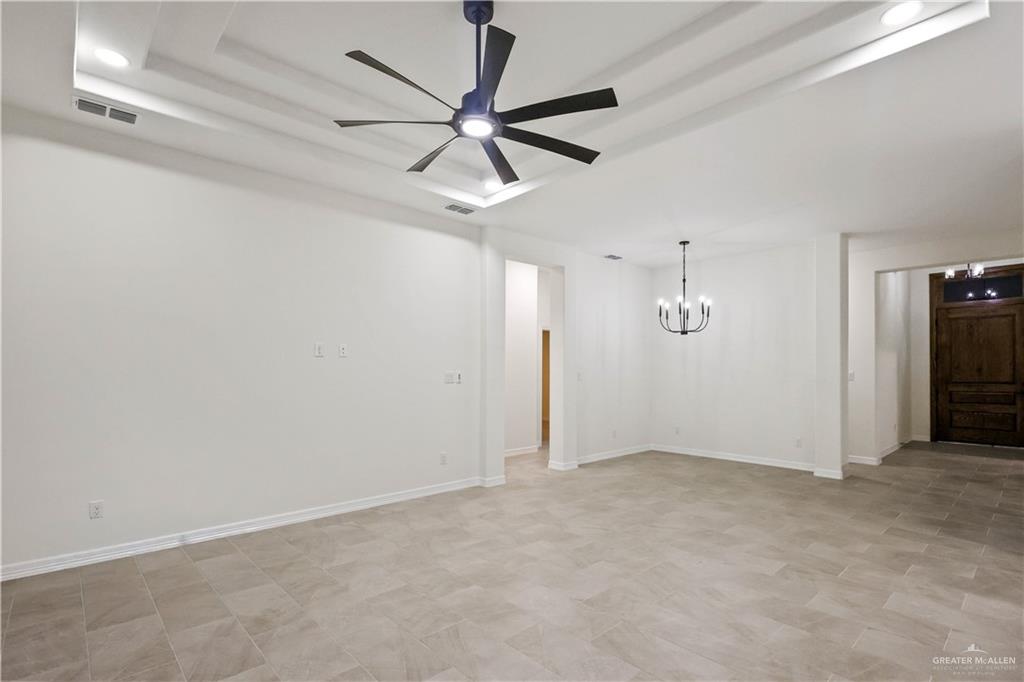 7305 North 55th Lane Mission, TX 78573 - Photo 8 of 26 wooden floor in an empty room