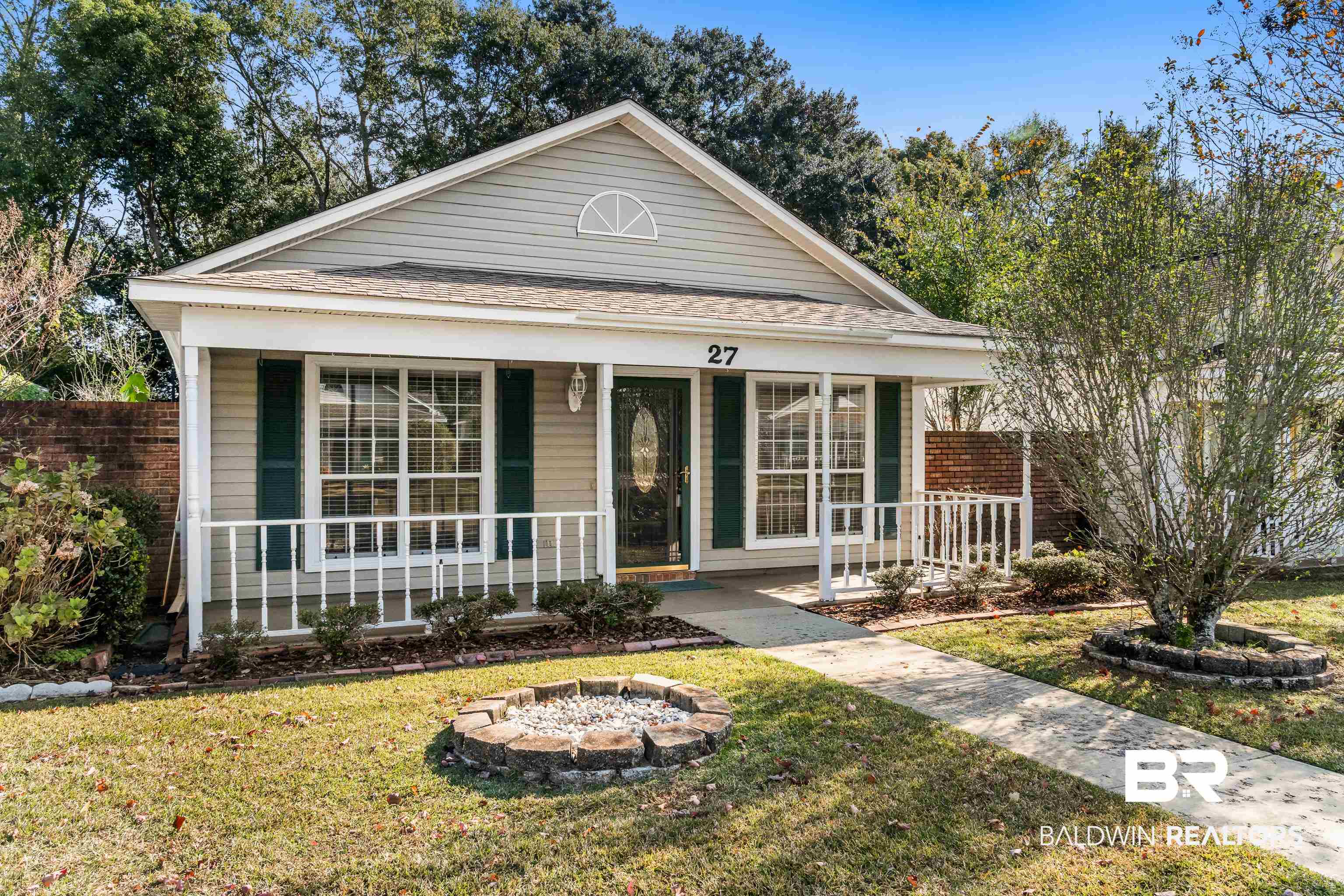 27 Cottage Drive Fairhope, AL 36532 - Photo 3 of 33 View of front of house featuring a porch and roof with shingles