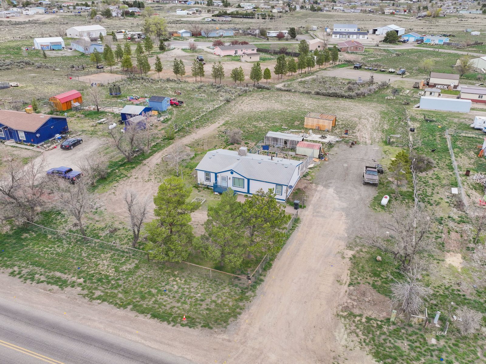 378 Spring Valley Parkway Spring Creek, NV 89815 - Photo 31 of 32 an aerial view of a houses with outdoor space