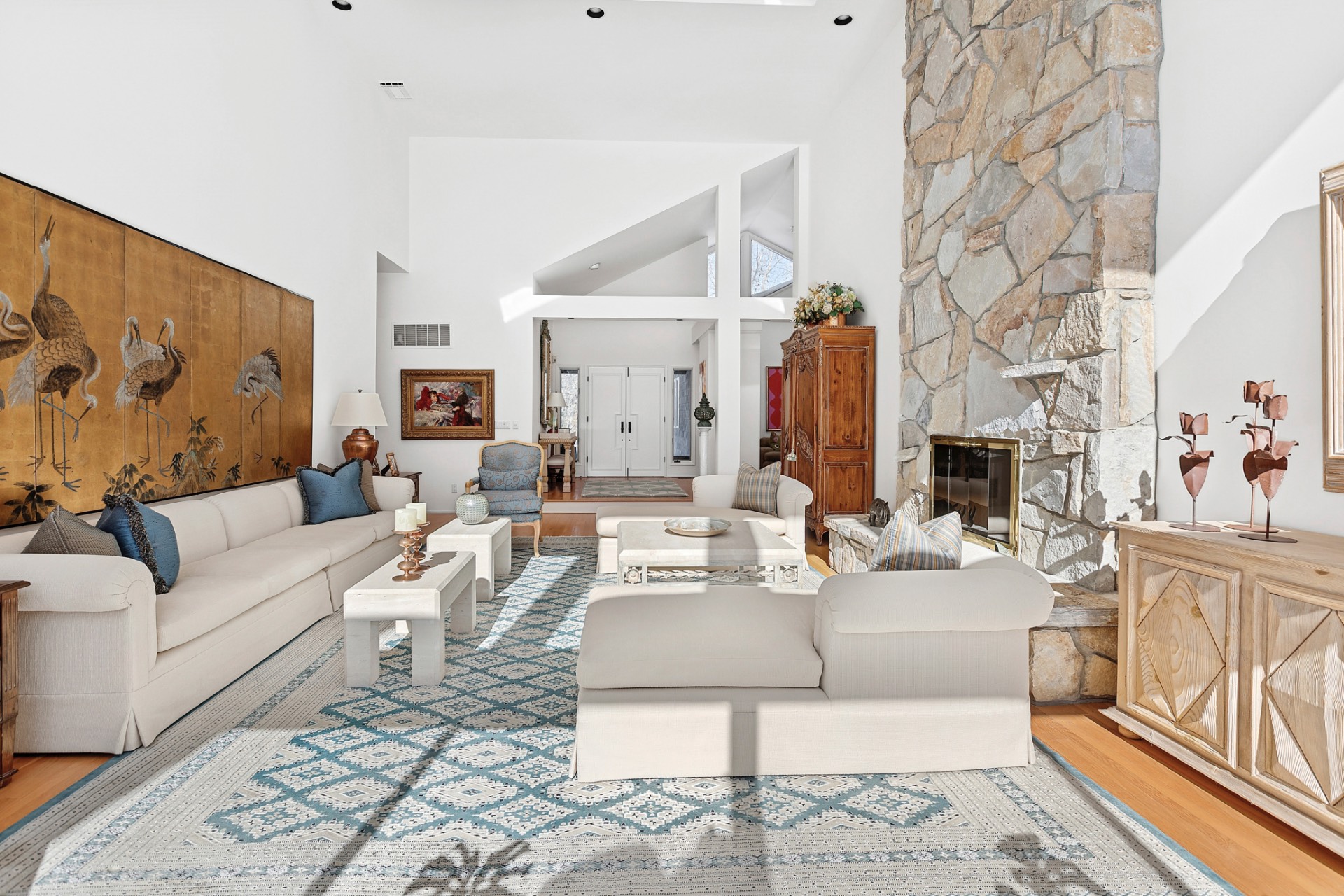 7 Chatfields Ridge Road East Hampton, NY 11937 - Photo 3 of 18 a living room with fireplace furniture and a rug