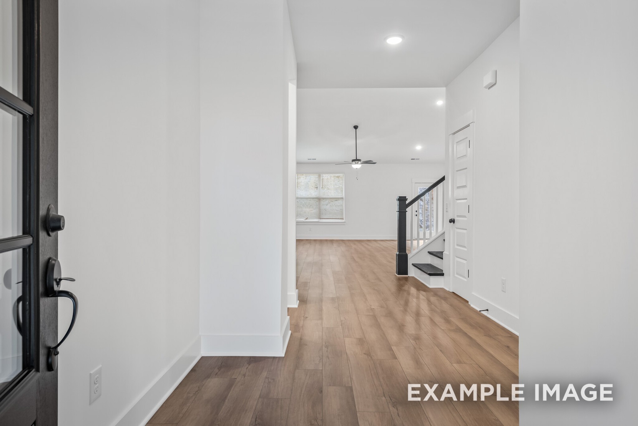 2882 Barnwood Road Gallatin, TN 37066 - Photo 41 of 99 a view of a room with wooden floor and staircase