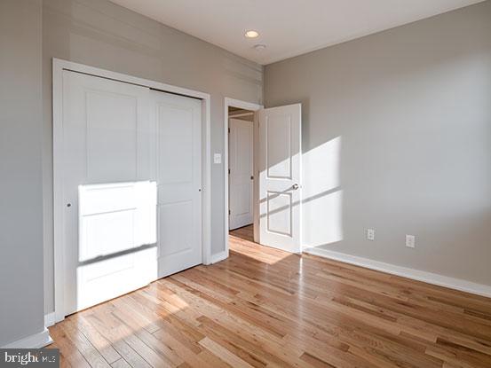 4427 Mitchell Street Philadelphia, PA 19128 - Photo 15 of 24 a view of empty room with wooden floor