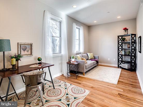4427 Mitchell Street Philadelphia, PA 19128 - Photo 10 of 24 a bedroom with furniture and a wooden floor