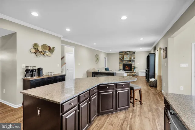 a bedroom with a bed that has a bed and a chair in it