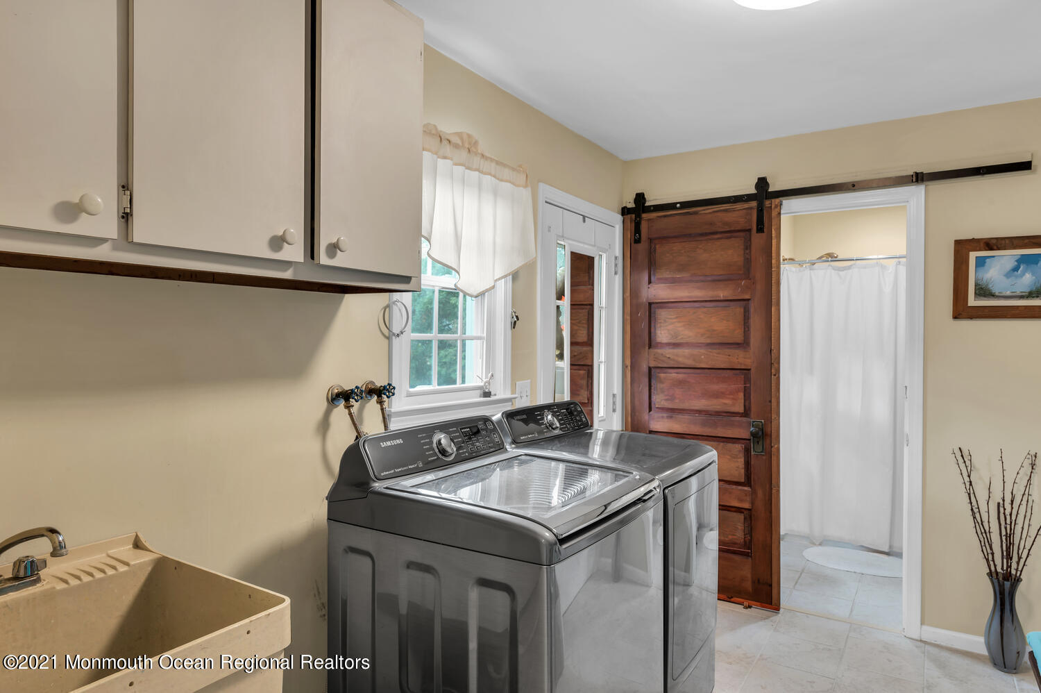 1207 Wall Road Spring Lake Heights, NJ 07762 - Photo 15 of 37 a bathroom with a sink and a mirror