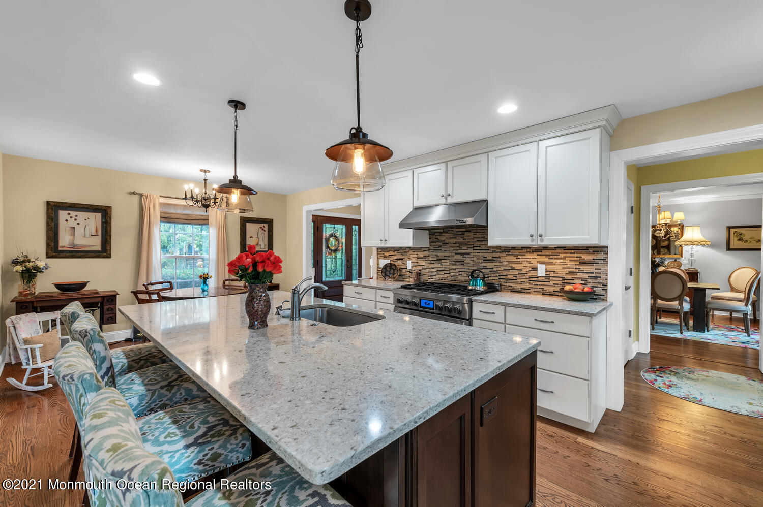 1207 Wall Road Spring Lake Heights, NJ 07762 - Photo 9 of 37 a kitchen with sink refrigerator and cabinets