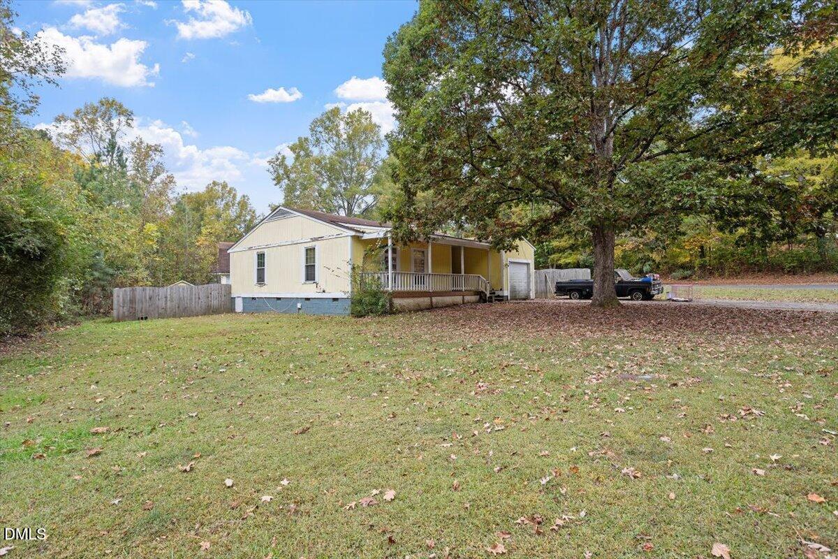 1600 Cranston Road Garner, NC 27529 - Photo 18 of 25 a front view of a house with a yard