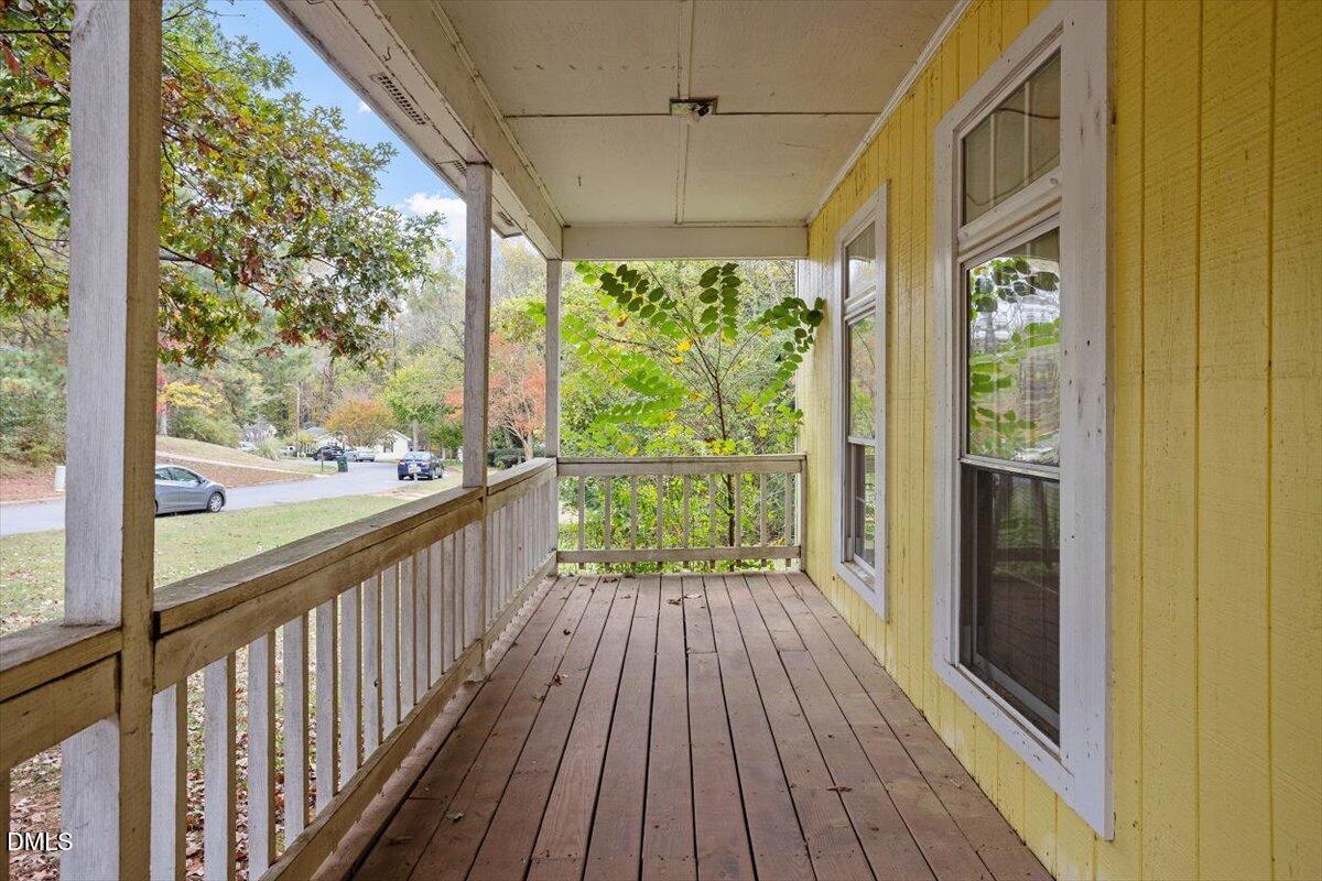 1600 Cranston Road Garner, NC 27529 - Photo 20 of 25 a view of a room with wooden floor outdoor view and balcony