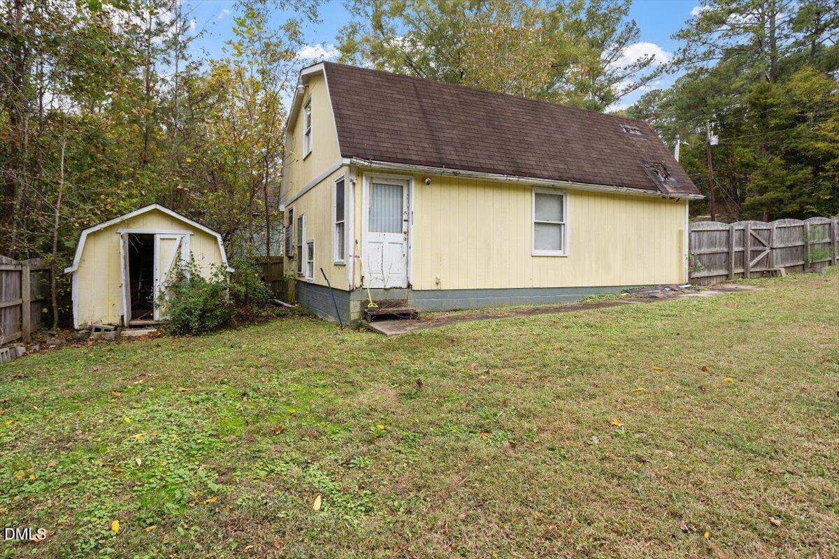 1600 Cranston Road Garner, NC 27529 - Photo 5 of 25 a view of a house with a yard