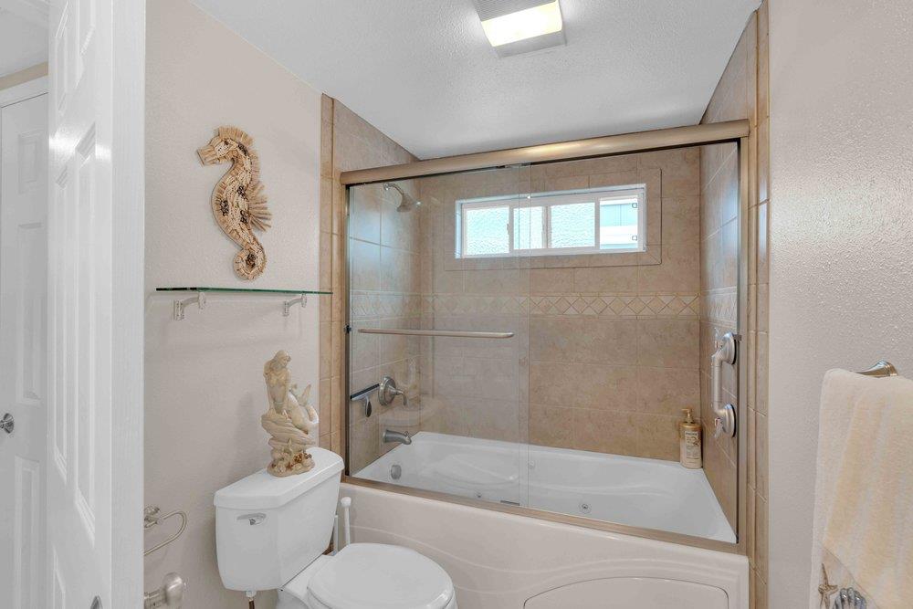 1854 St George Road Danville, CA 94526 - Photo 16 of 47 a bathroom with a toilet a sink and bathtub