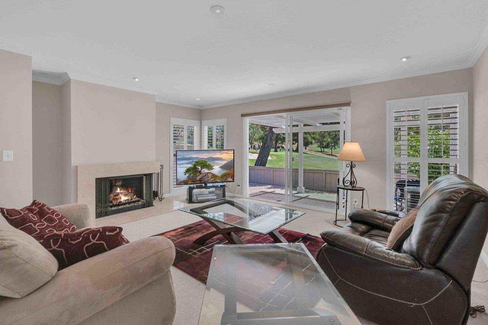 1854 St George Road Danville, CA 94526 - Photo 4 of 47 a living room with furniture a large window and a fireplace