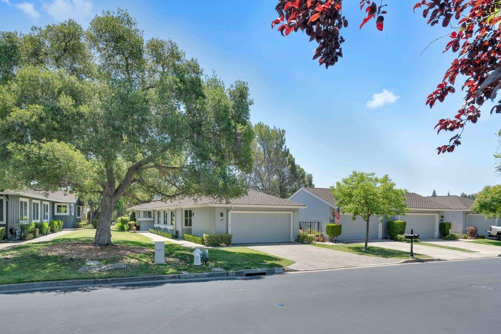 1854 St George Road Danville, CA 94526 - Photo 43 of 47 a front view of a house with a yard and garage