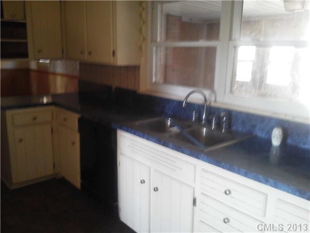 134 Anne Neely Road Gastonia, NC 28056 - Photo 2 of 6 a kitchen with a sink and cabinets