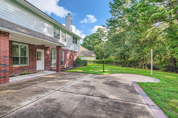 a view of a backyard with a garden