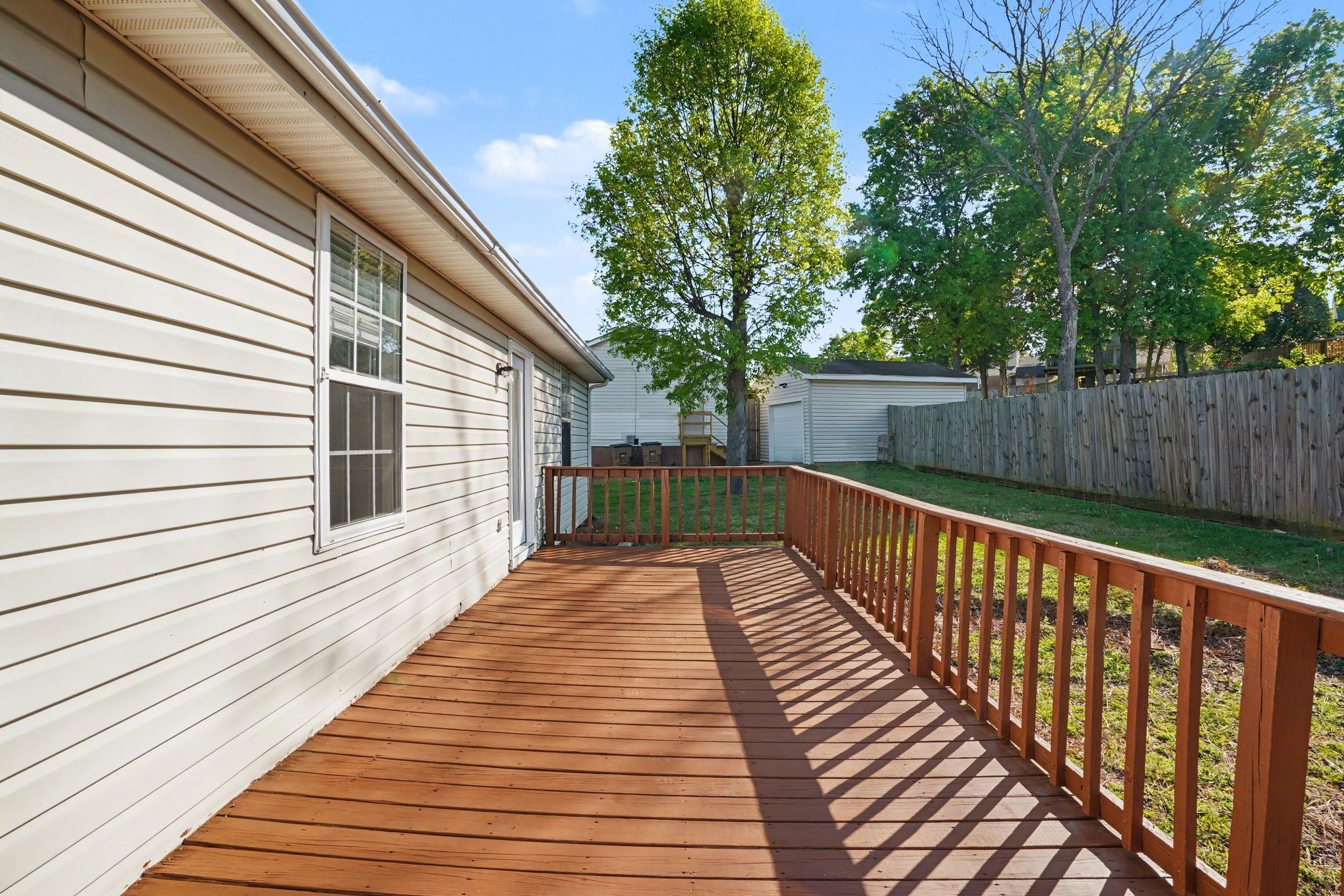 3112 Country Way Road Antioch, TN 37013 - Photo 17 of 19 a view of deck with wooden floor and fence next to a yard