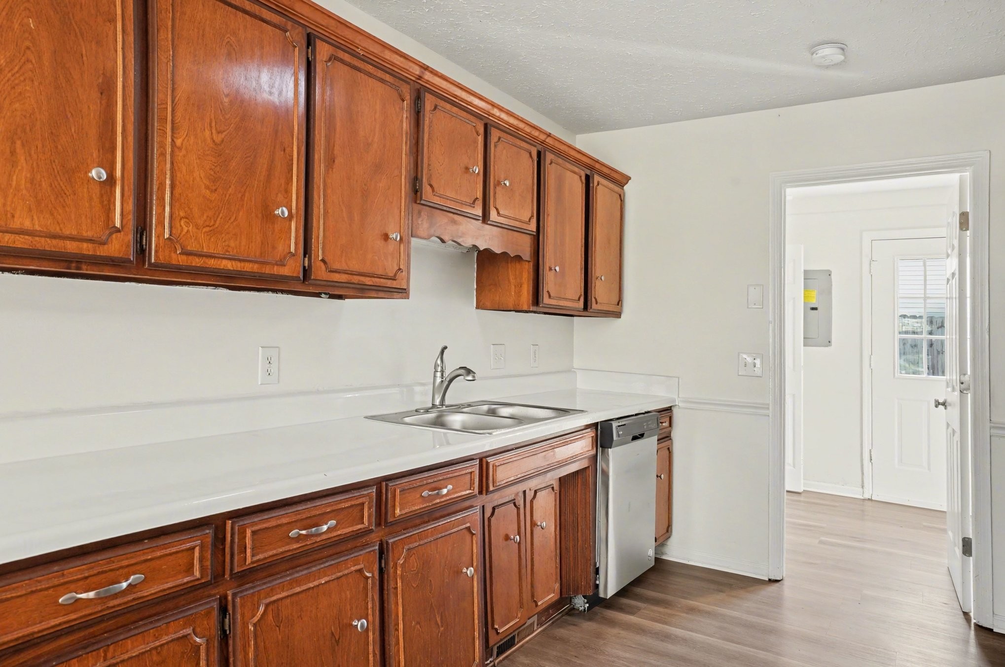 3112 Country Way Road Antioch, TN 37013 - Photo 7 of 19 a kitchen with stainless steel appliances granite countertop a sink a cabinets and wooden floor