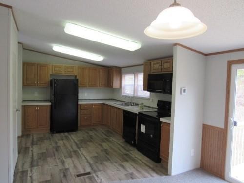 1335 Walnut Grove Church Road Dayton, TN 37321 - Photo 2 of 8 a kitchen with stainless steel appliances granite countertop a refrigerator and a sink