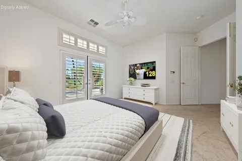 a spacious bathroom with a granite countertop sink mirror and bathtub