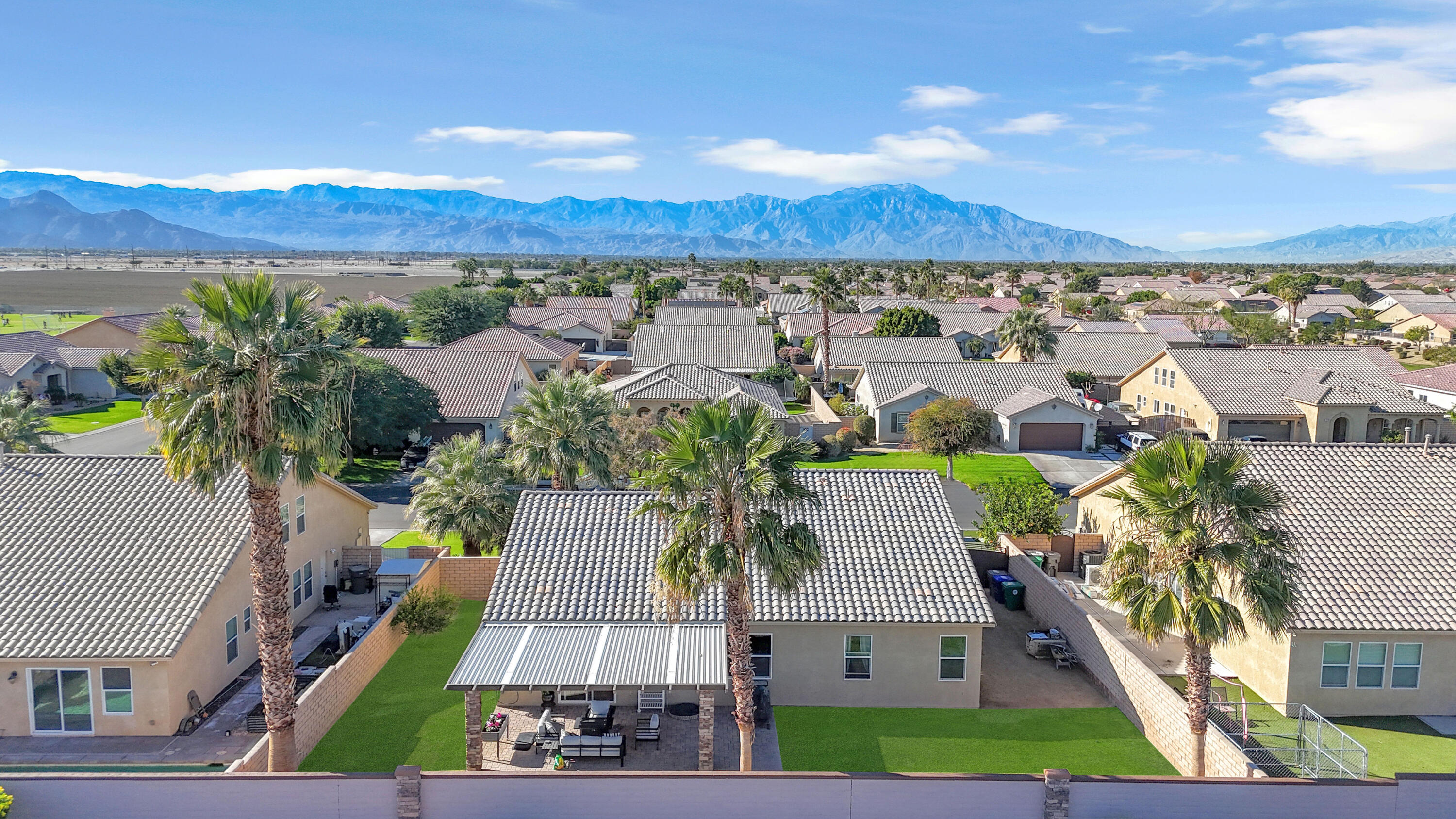 41394 Hanover Street Indio, CA 92203 - Photo 11 of 19 an aerial view of residential houses with outdoor space and street view