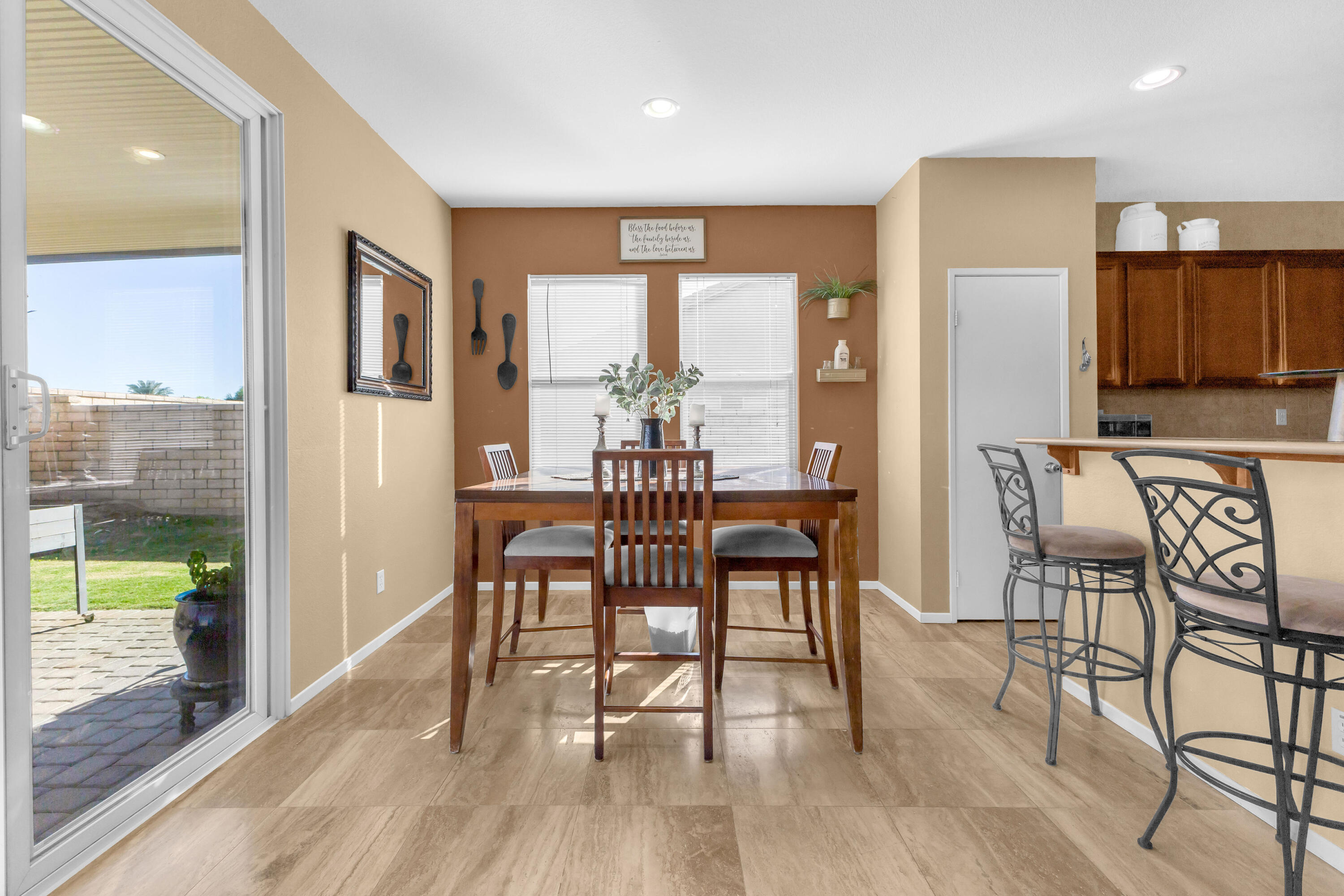 41394 Hanover Street Indio, CA 92203 - Photo 14 of 49 a view of a a dining room with furniture window and wooden floor