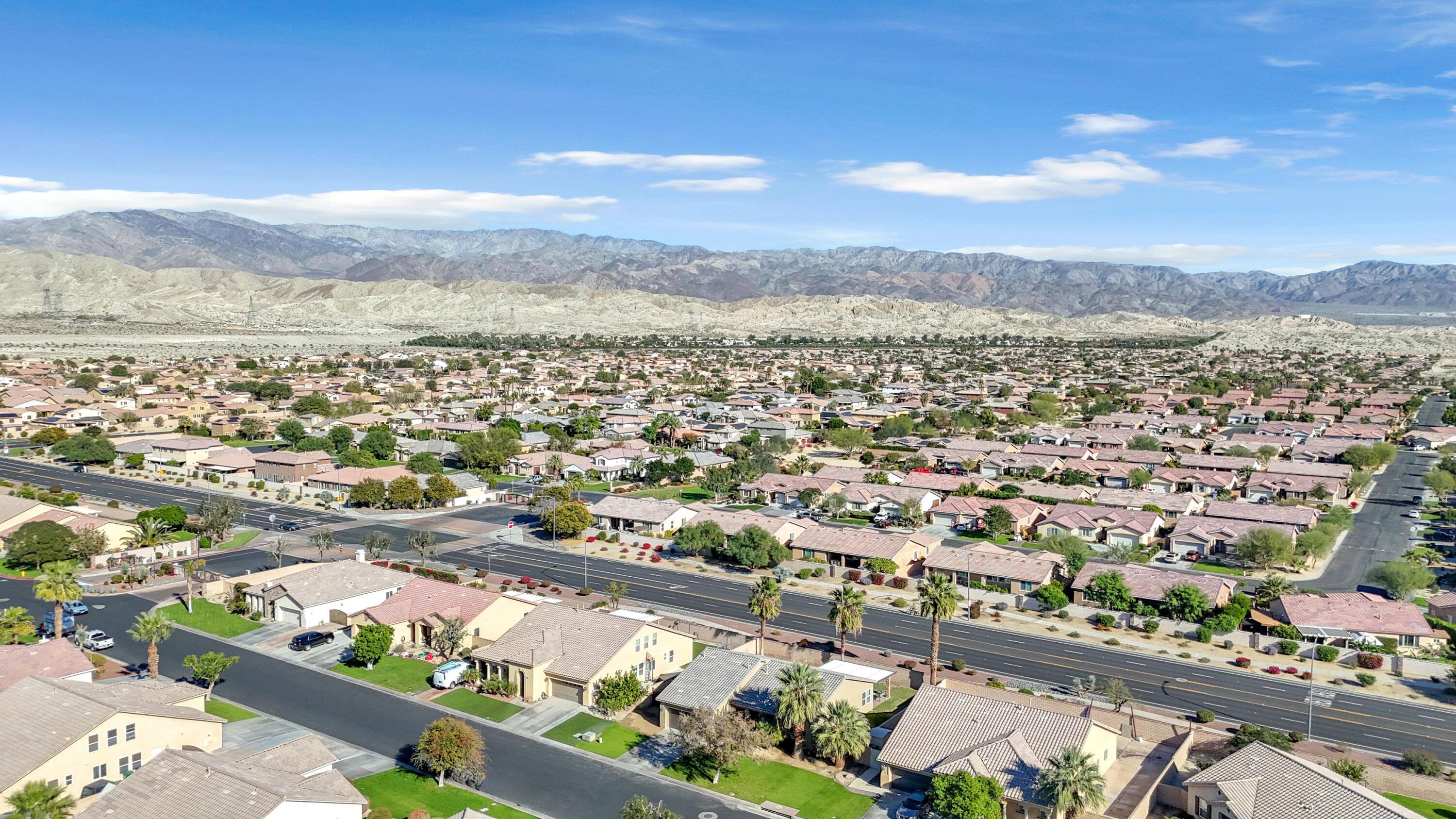 41394 Hanover Street Indio, CA 92203 - Photo 16 of 19 an aerial view of residential houses with outdoor space