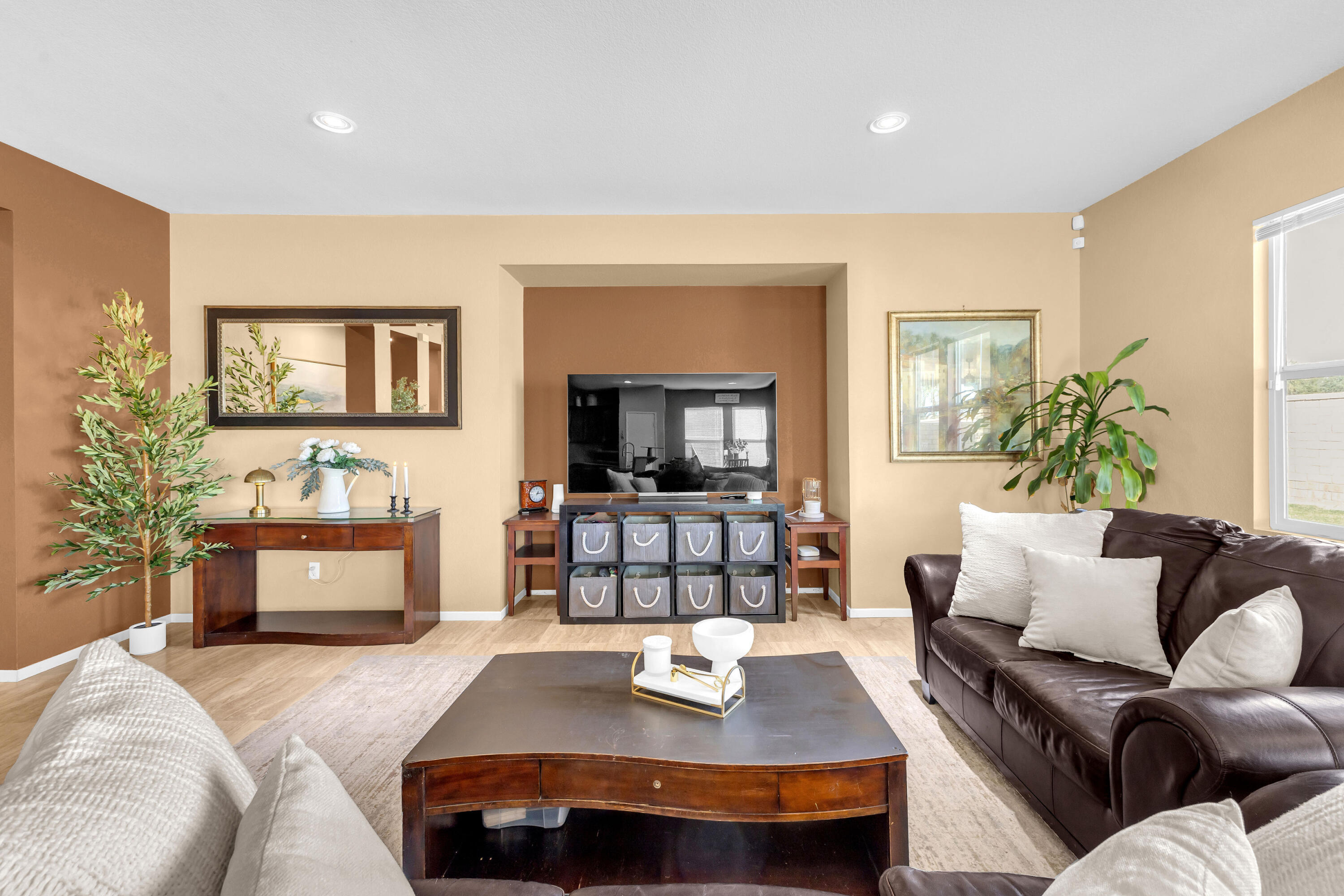 41394 Hanover Street Indio, CA 92203 - Photo 17 of 49 a living room with furniture and a flat screen tv