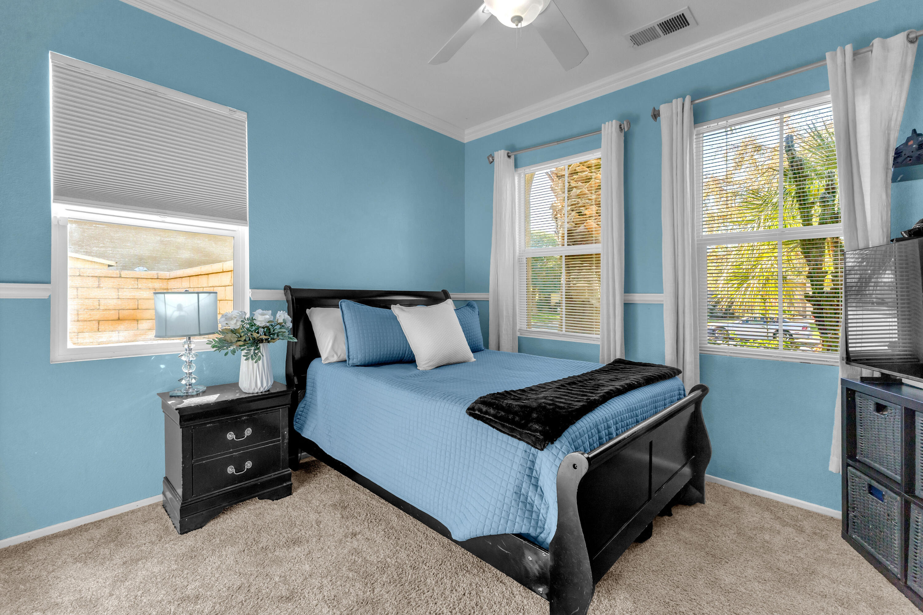 41394 Hanover Street Indio, CA 92203 - Photo 23 of 49 a bedroom with a bed and a window