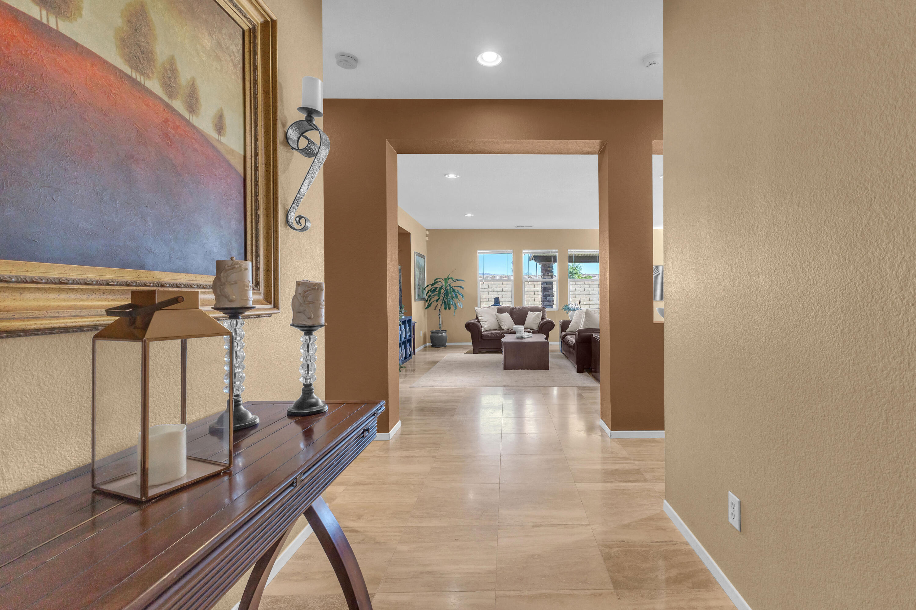 41394 Hanover Street Indio, CA 92203 - Photo 4 of 49 a view of a hallway with a livingroom and furniture