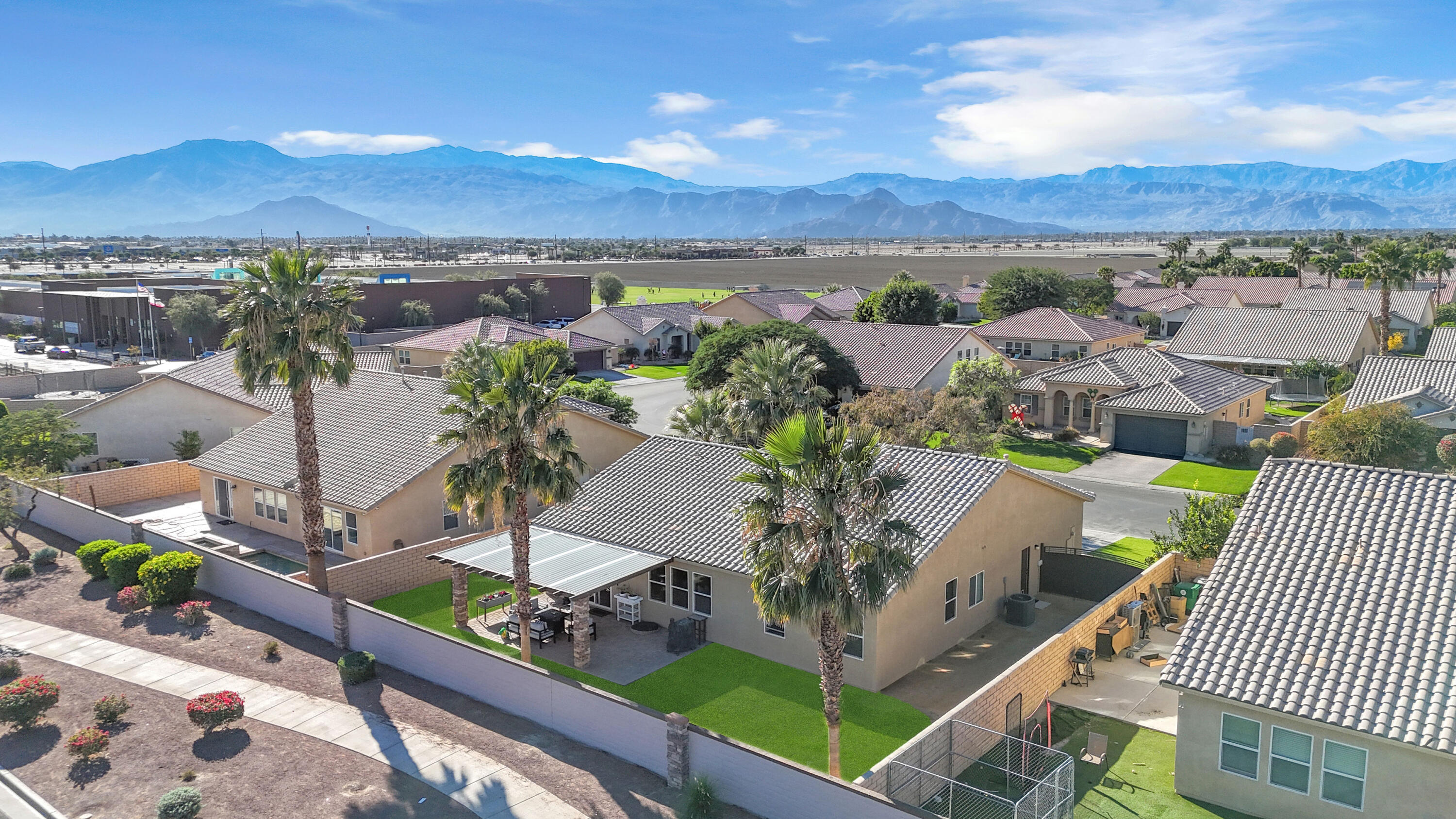 41394 Hanover Street Indio, CA 92203 - Photo 43 of 49 an aerial view of a house with a garden view