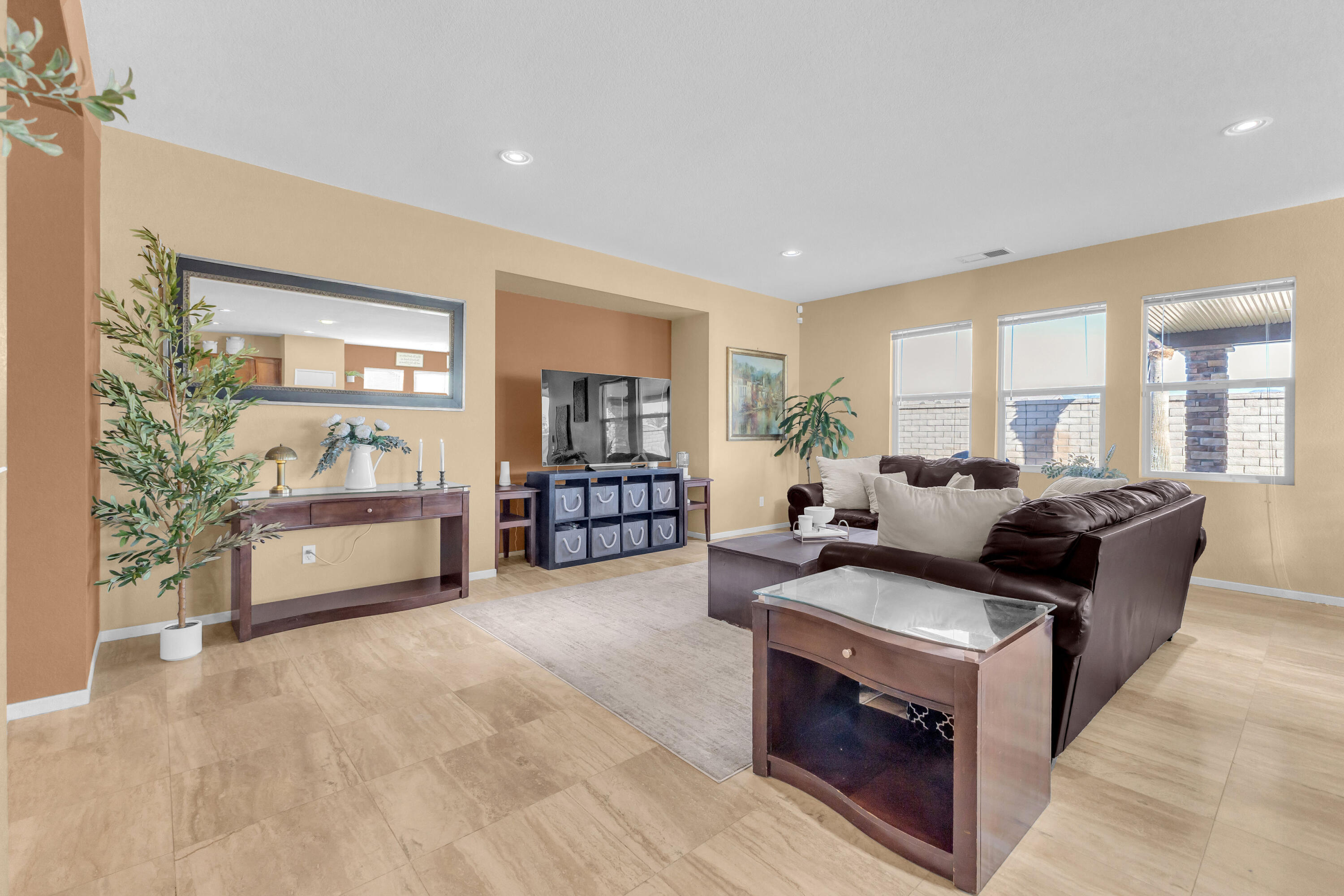41394 Hanover Street Indio, CA 92203 - Photo 6 of 49 a living room with furniture and a large window