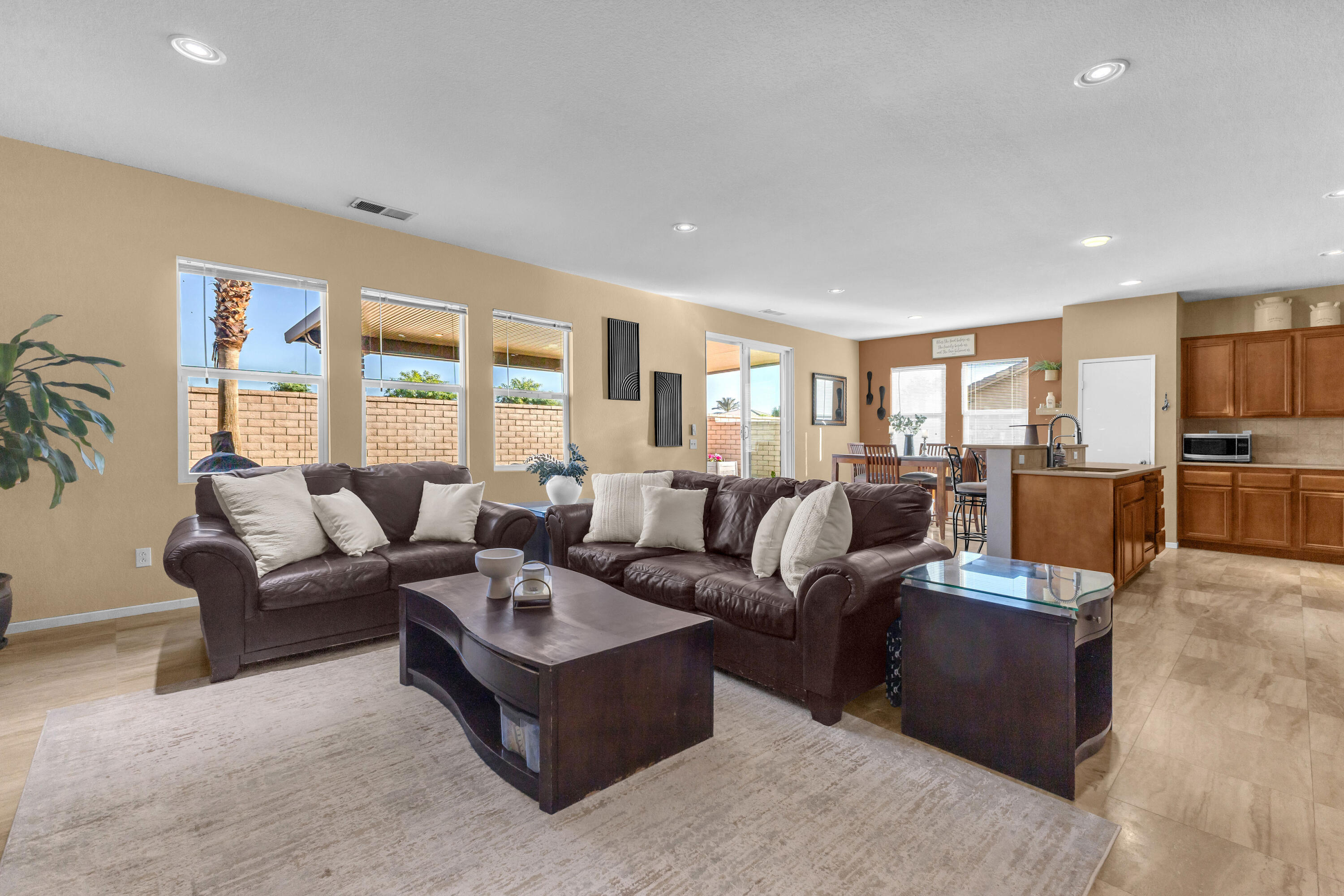 41394 Hanover Street Indio, CA 92203 - Photo 7 of 49 a living room with furniture and a large window