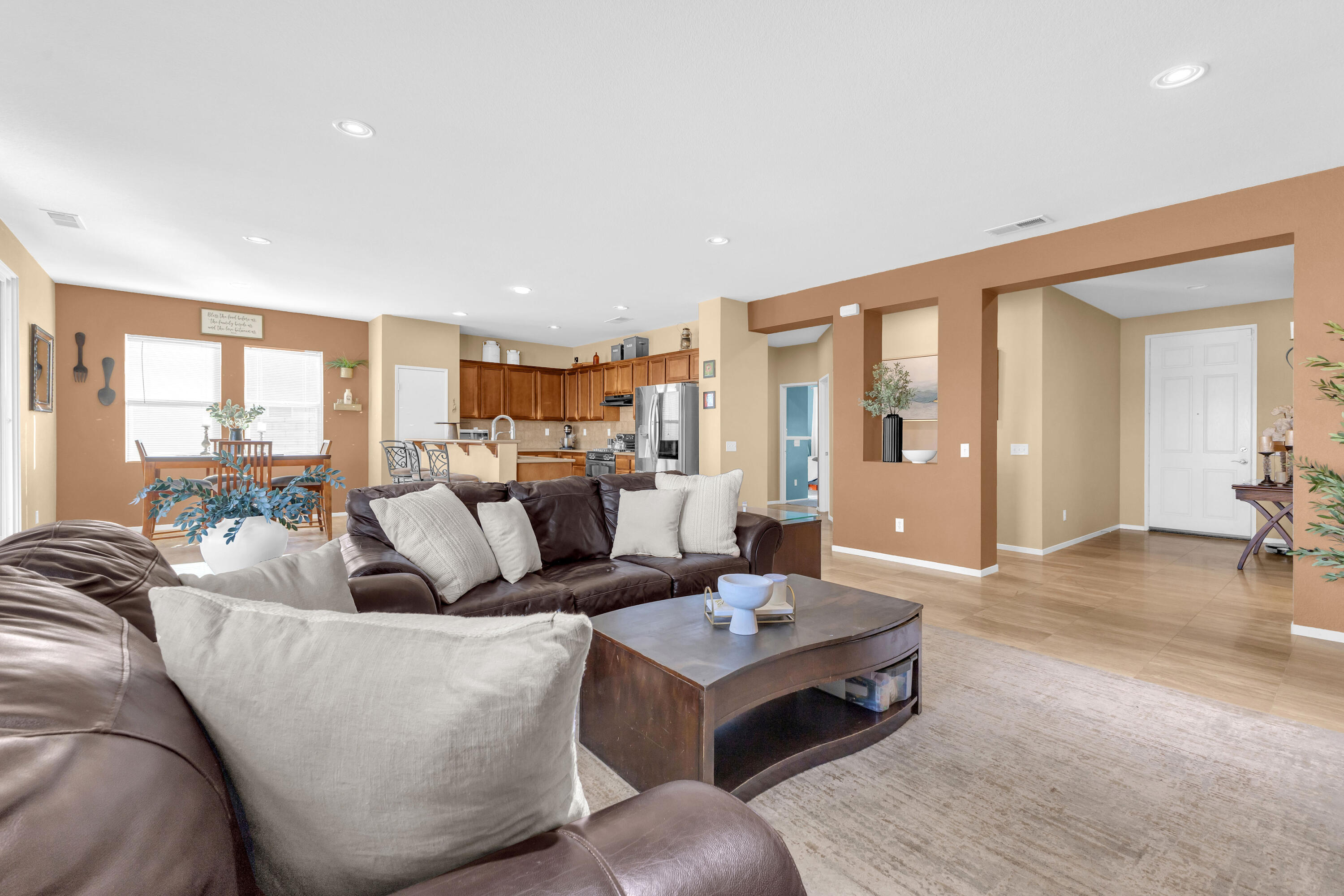 41394 Hanover Street Indio, CA 92203 - Photo 8 of 49 a living room with furniture wooden floor and a large window