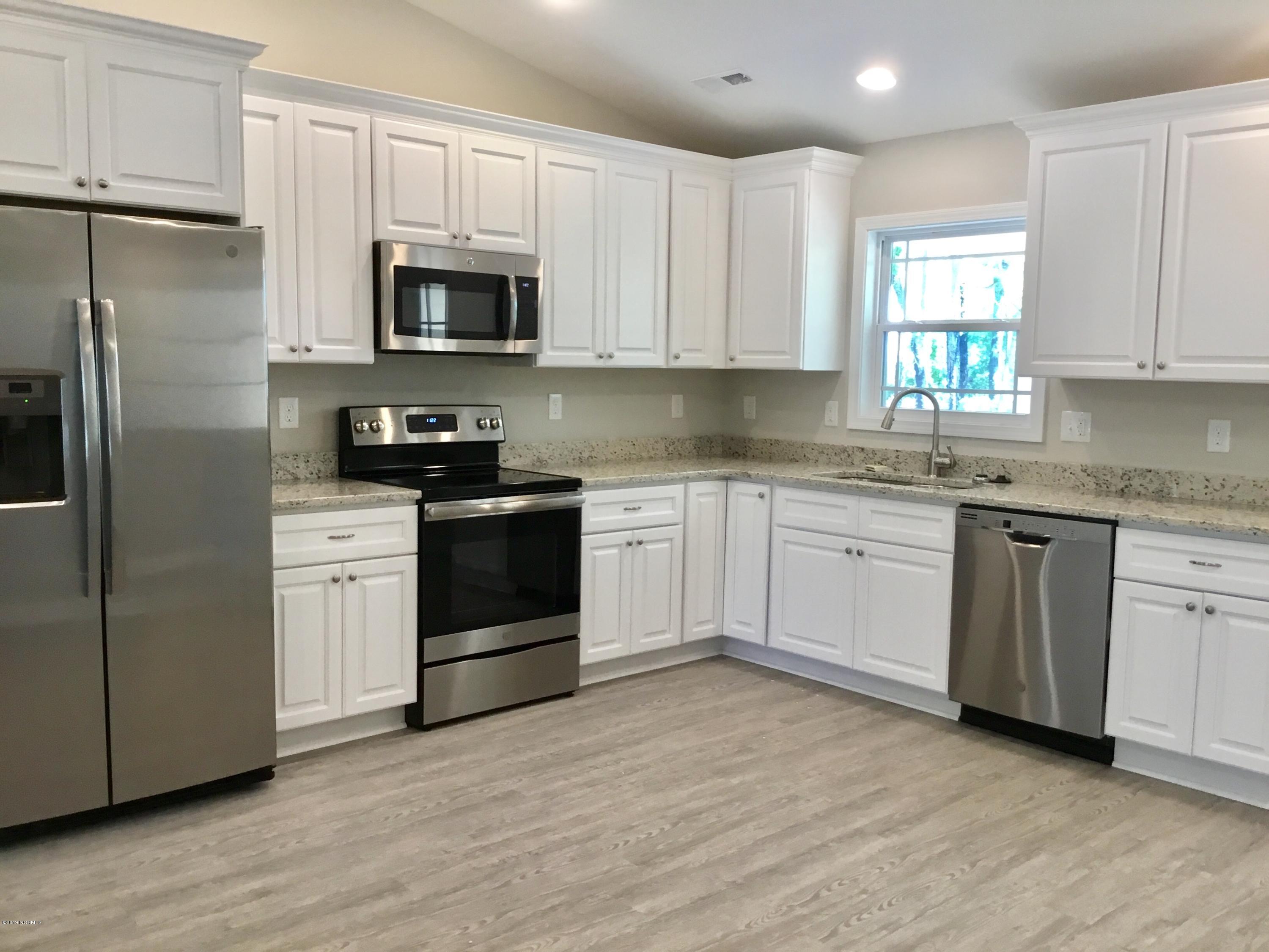 74 Ash Road Southport, NC 28461 - Photo 4 of 14 480BDA6F-E057-4D18-AD96-864A02464518