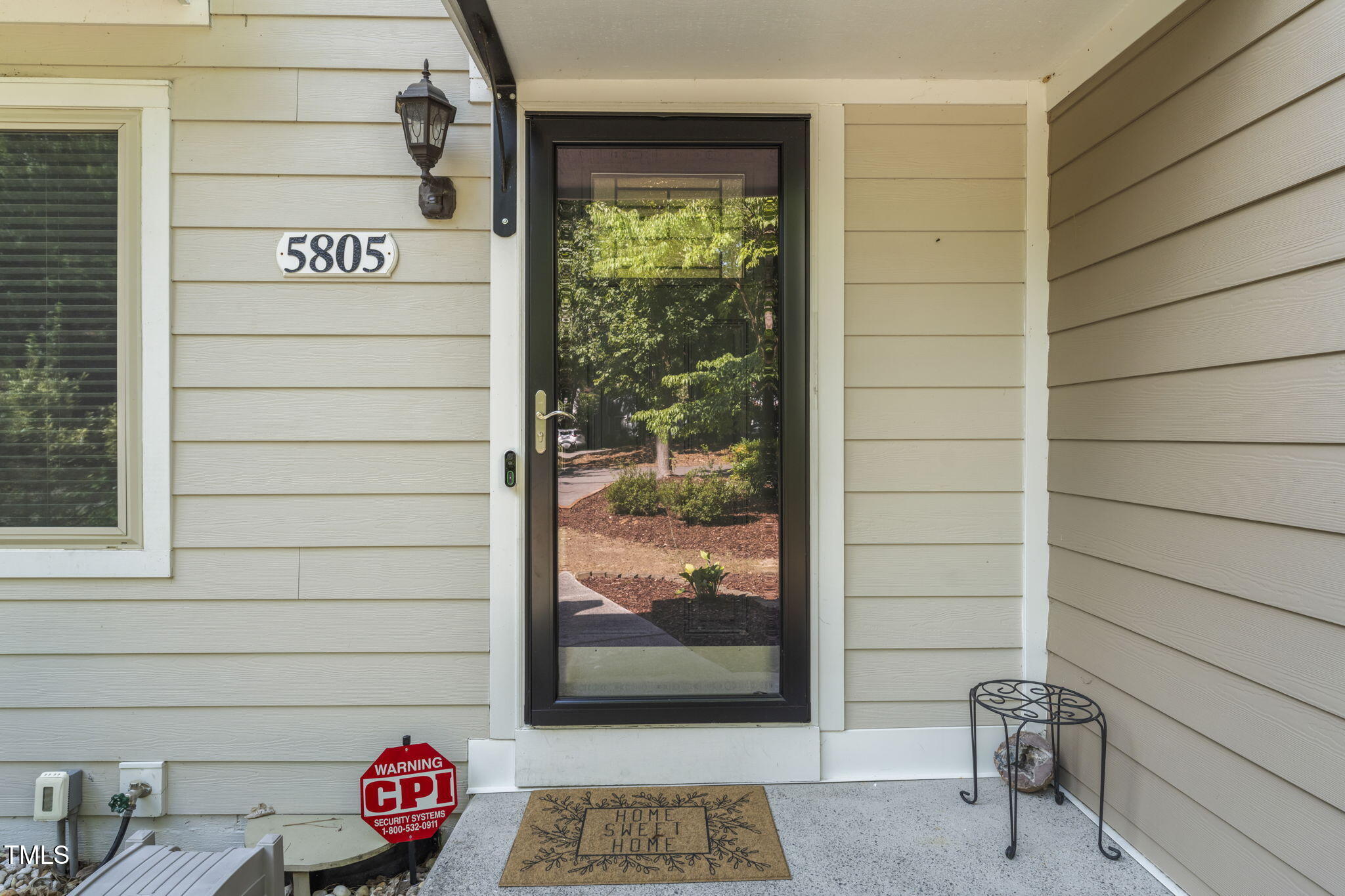 5805 Mapleridge Road Raleigh, NC 27609 - Photo 3 of 46 a view of a door and a window
