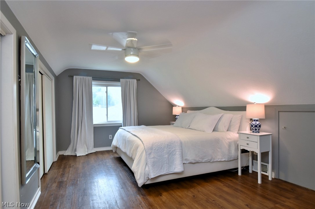 1174 Haverston Road Cleveland, OH 44124 - Photo 16 of 21 Bedroom with dark hardwood / wood-style floors, ceiling fan, and lofted ceiling