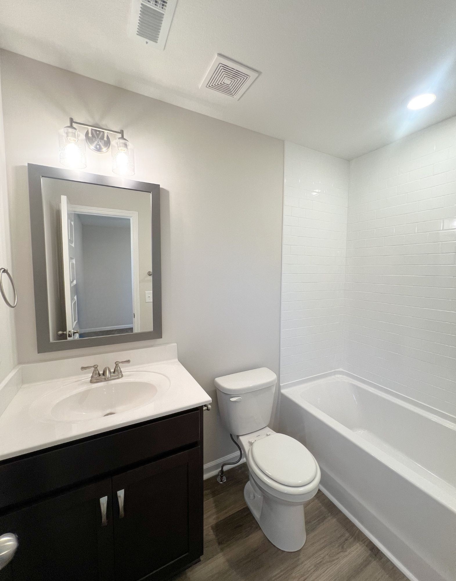 1130 Pembroke Oak Grove Road, Unit 4 Oak Grove, KY 42262 - Photo 22 of 37 a bathroom with a sink toilet mirror and bathtub