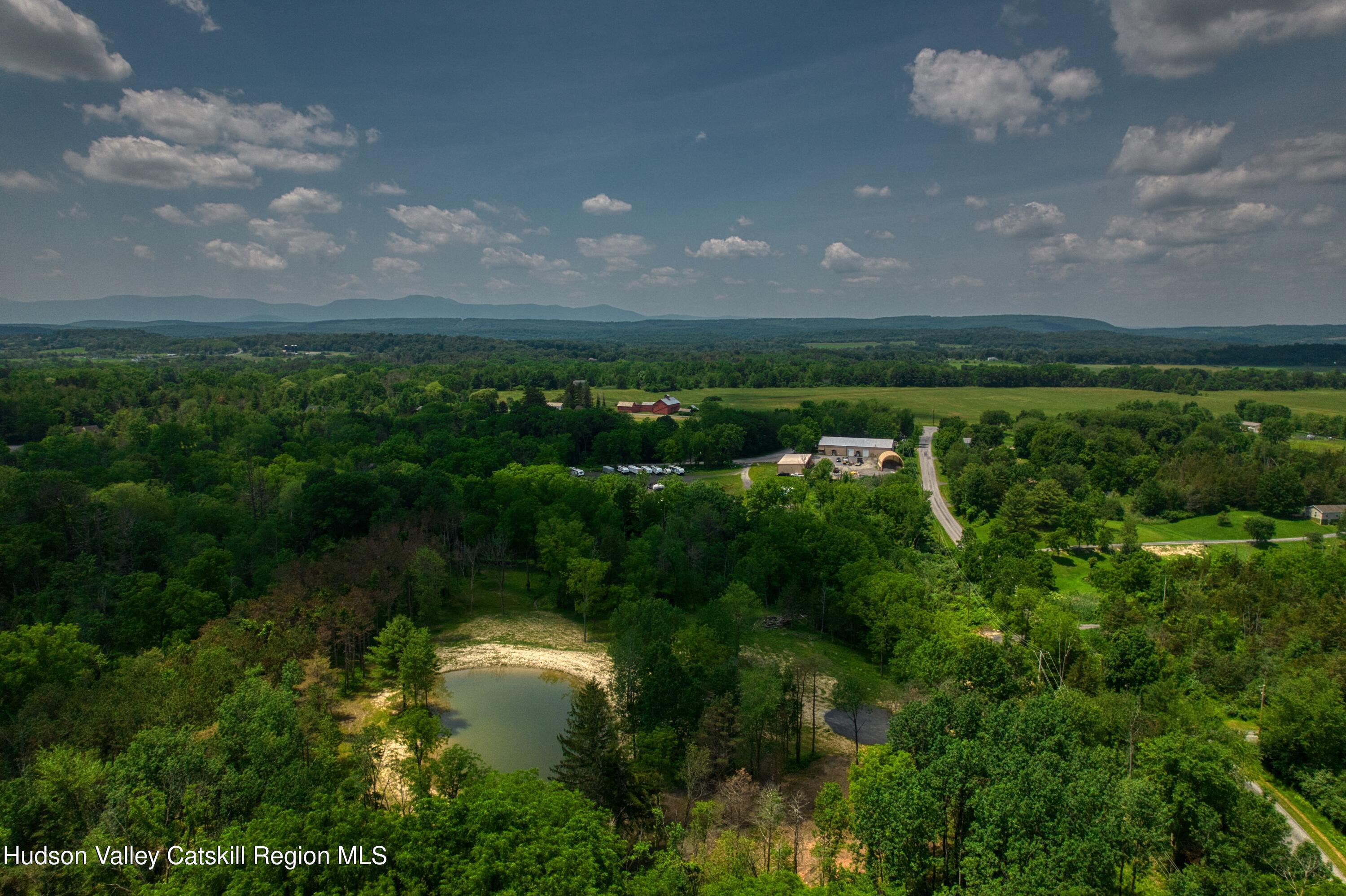 0 Adams Road Coxsackie, NY 12051 - Photo 16 of 23 a view of lake with green space